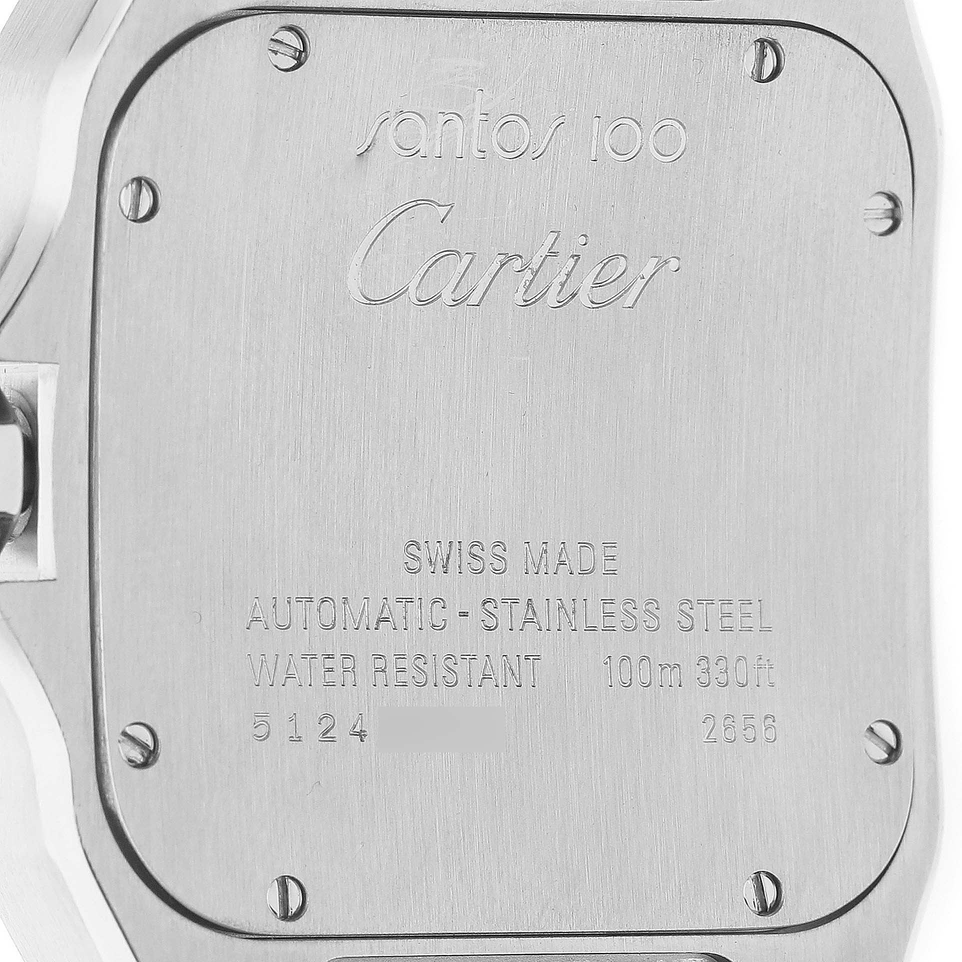 The image shows the back case of a Cartier Santos W20073X8 Men's Stainless Steel Silver Dial watch, featuring engravings and screws.