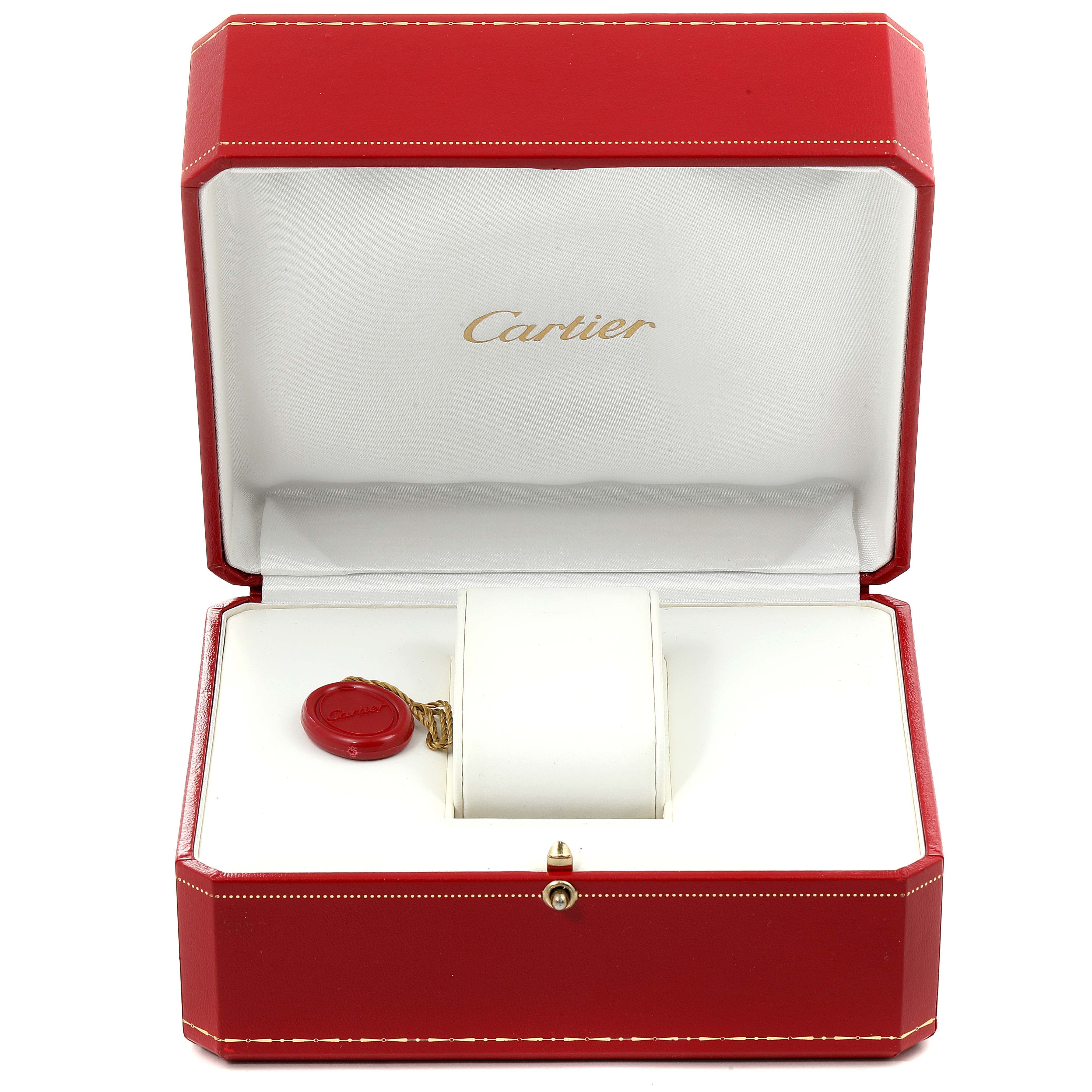 The image shows an open Cartier Tank Francaise W51028Q3 Women's Stainless Steel Mother of Pearl Dial W51028Q3 Women's Stainless Steel Mother of Pearl Dial watch box, displaying the interior with a watch cushion and a red wax seal.