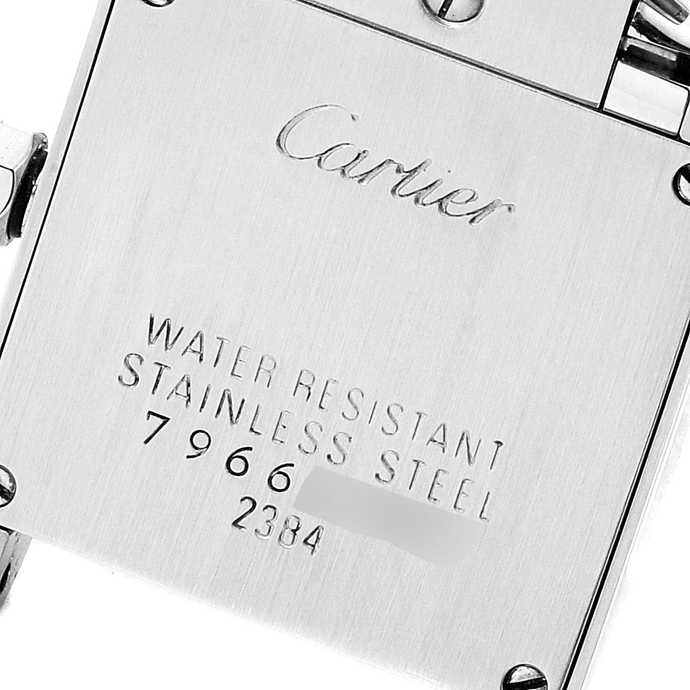 The image shows the back case of a Cartier Tank Française watch, highlighting the brand name and model details.