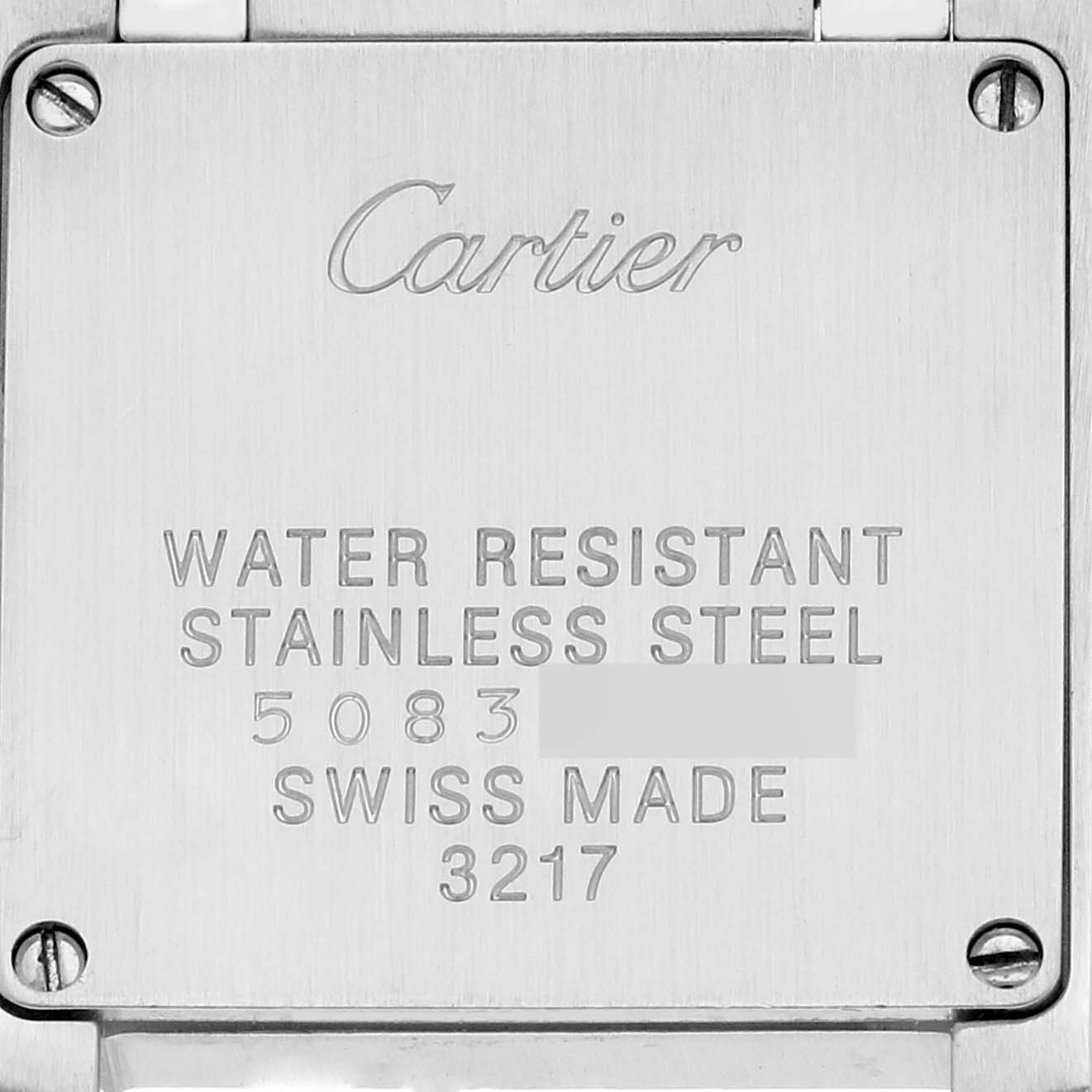 The image shows the back case of a Cartier Tank Française watch, highlighting its water resistance and stainless steel material.