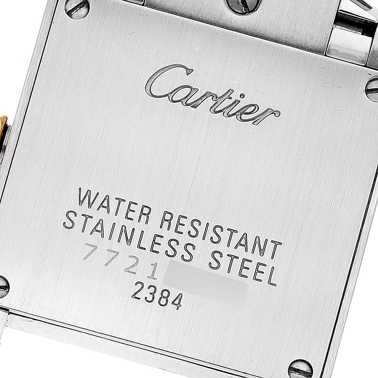 The image shows the back case of a Cartier Tank Française watch, displaying the brand name and specifications.