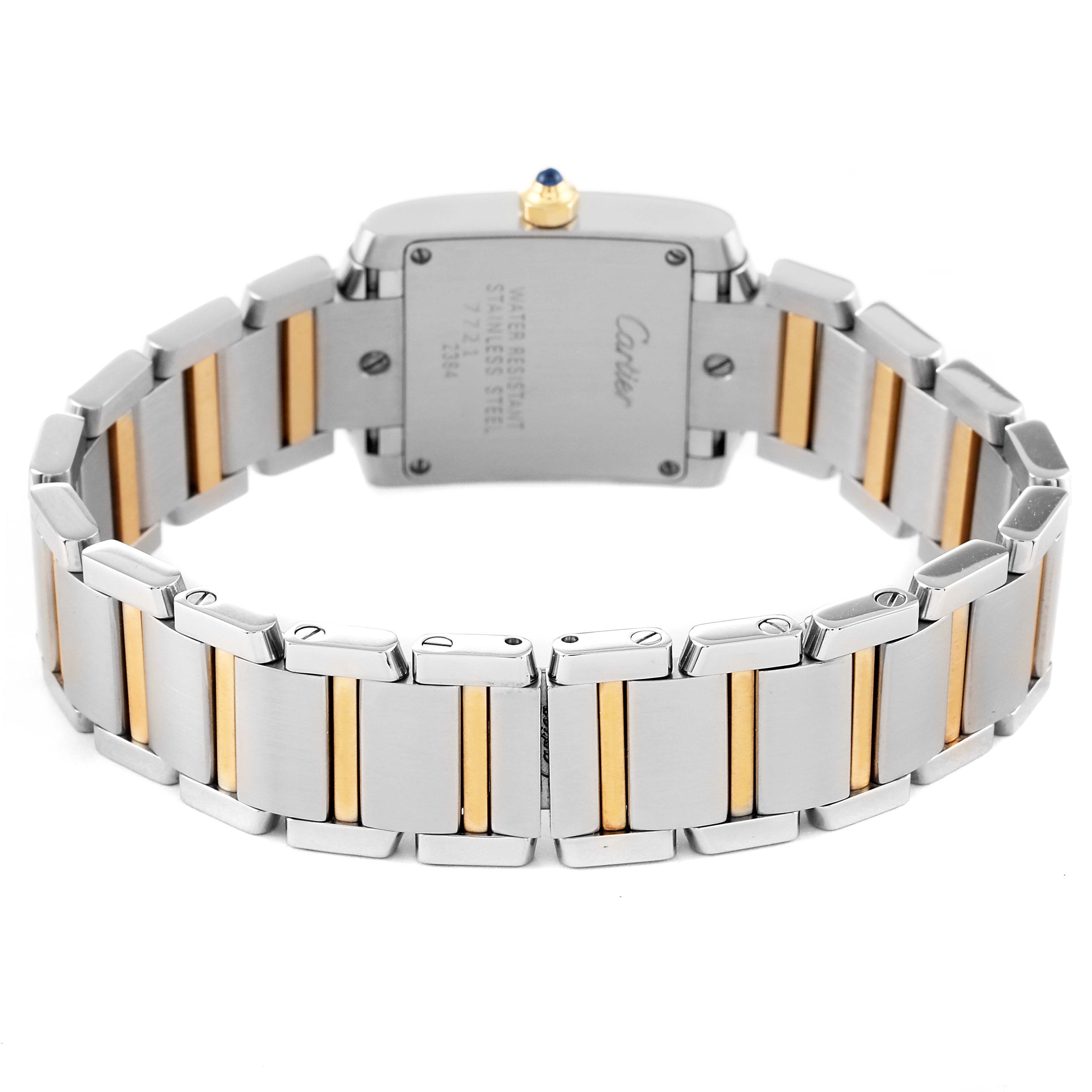 The image shows the back angle of a Cartier Tank Française watch, highlighting its two-tone stainless steel and gold bracelet.