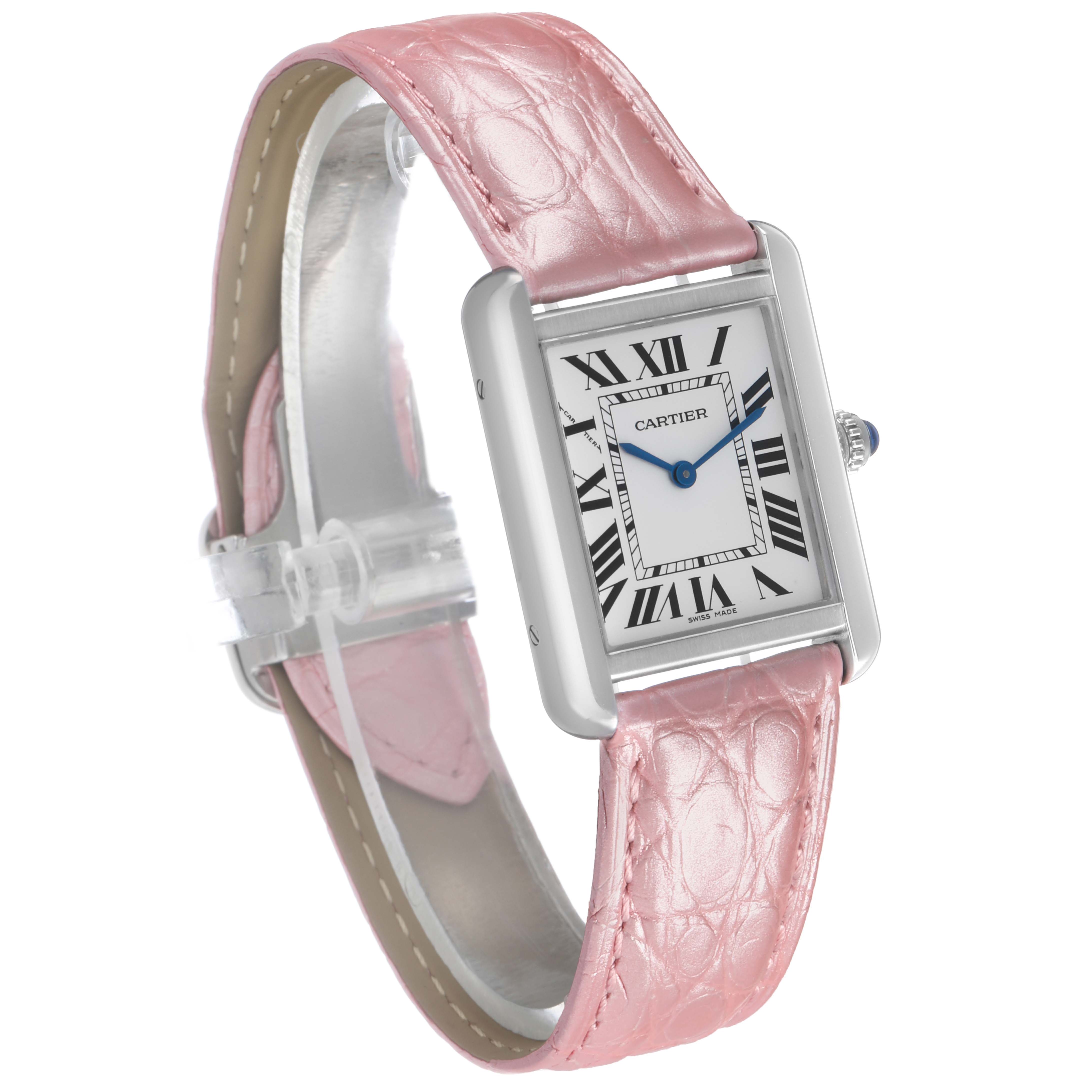 The Cartier Tank Solo WSTA0030 Women's Stainless Steel Silver Dial watch is shown at a three-quarter angle, highlighting its face, bezel, and pink leather strap.