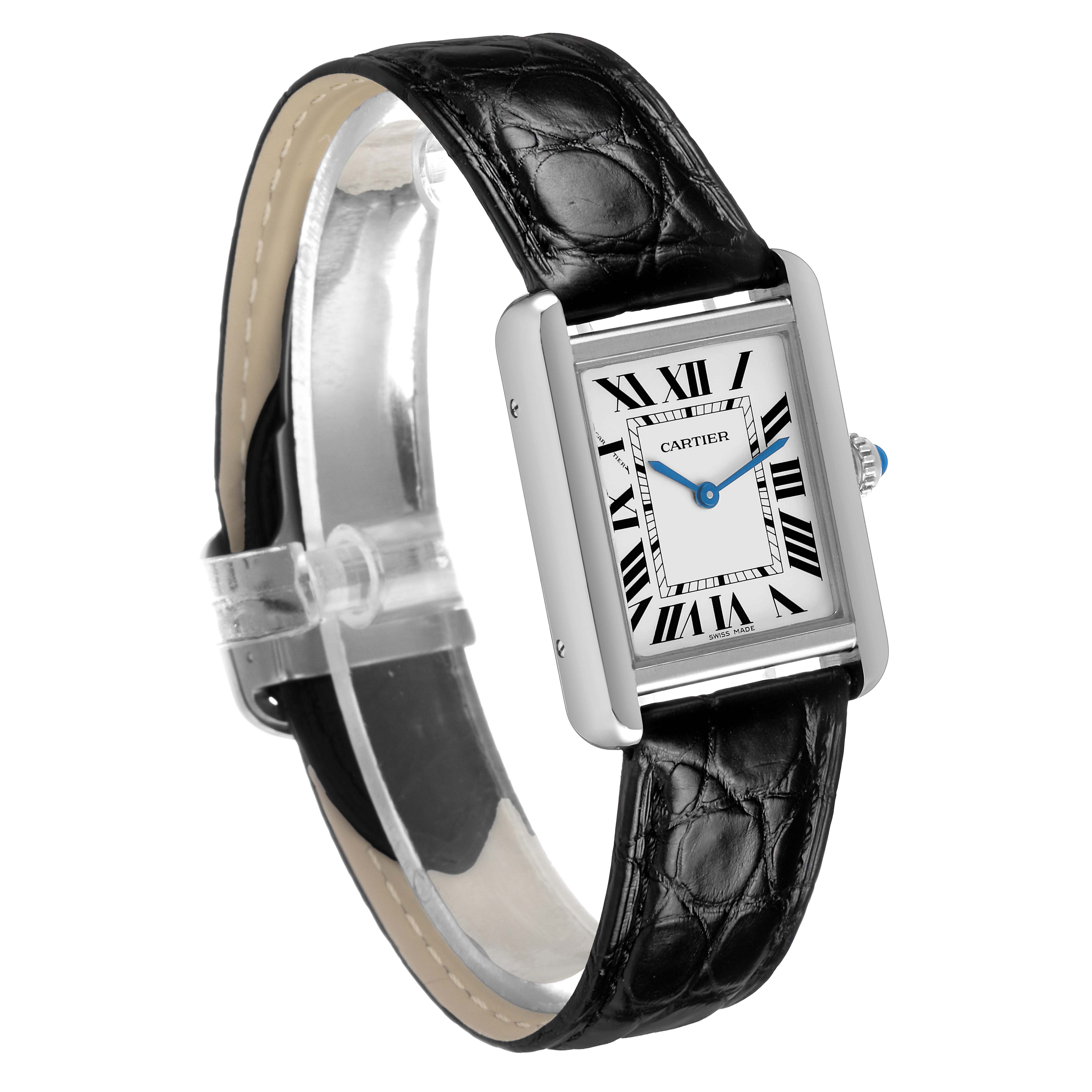 The Cartier Tank Solo WSTA0030 Women's Stainless Steel Silver Dial watch is shown at a three-quarter angle, displaying its rectangular face, Roman numeral dial, and black leather strap.
