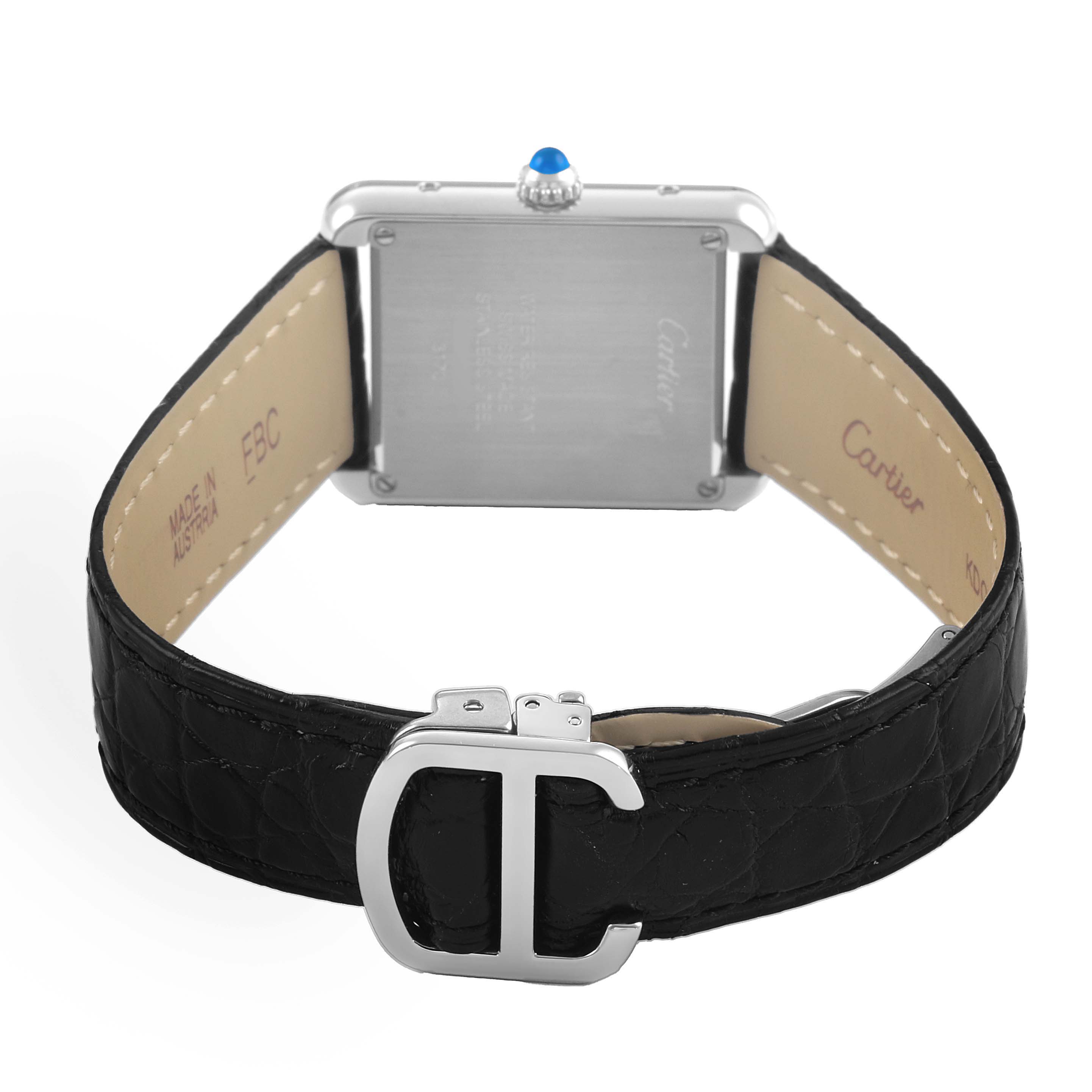 The image shows the back of the Cartier Tank Solo WSTA0030 Women's Stainless Steel Silver Dial watch, featuring the case back, crown, and leather strap with deployment clasp.