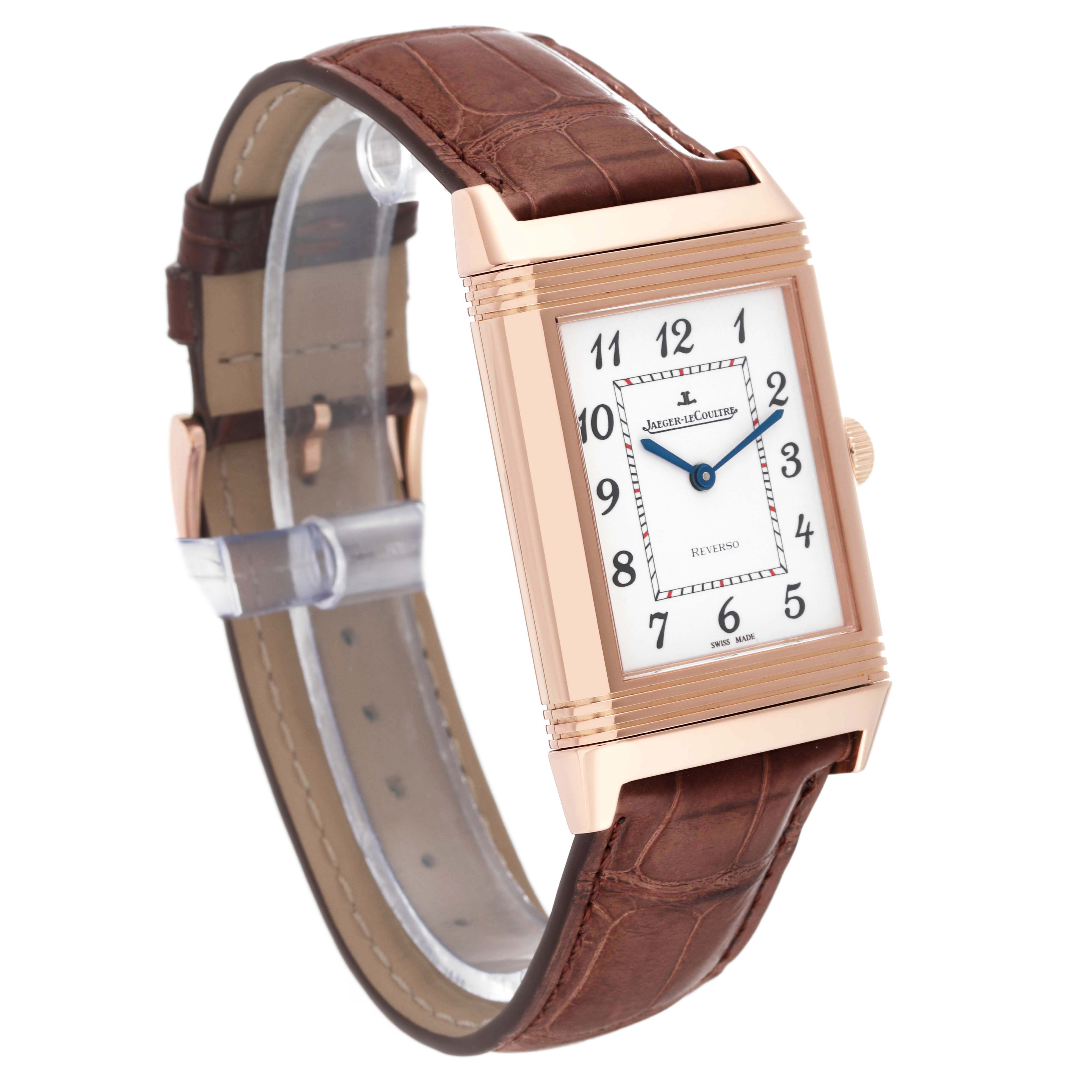 This image shows a Jaeger-LeCoultre Reverso model watch at a three-quarter angle, highlighting its face, leather strap, and crown.
