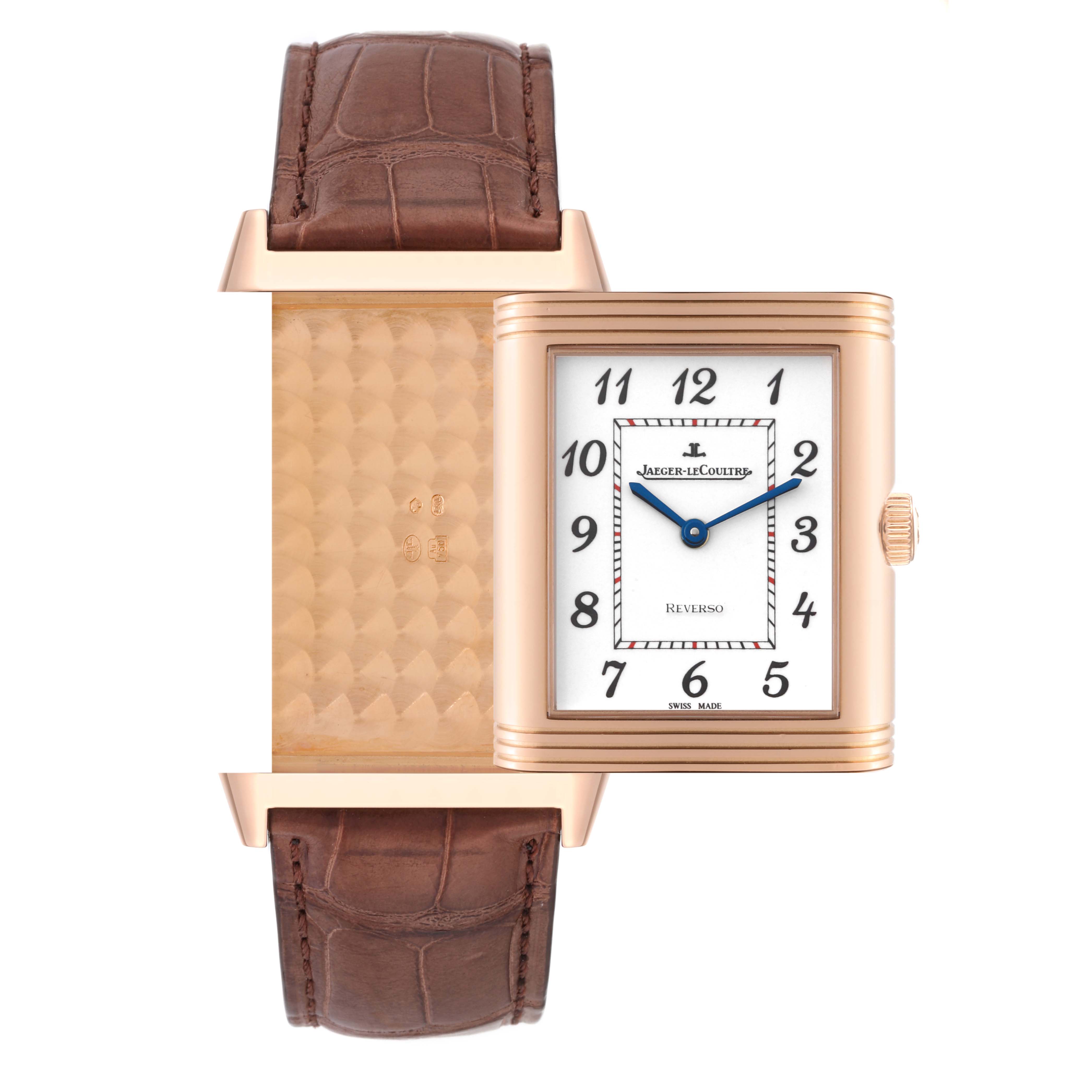 The Reverso model by Jaeger-LeCoultre is shown at an angle that displays both the front dial and the reverse case with a brown leather strap.