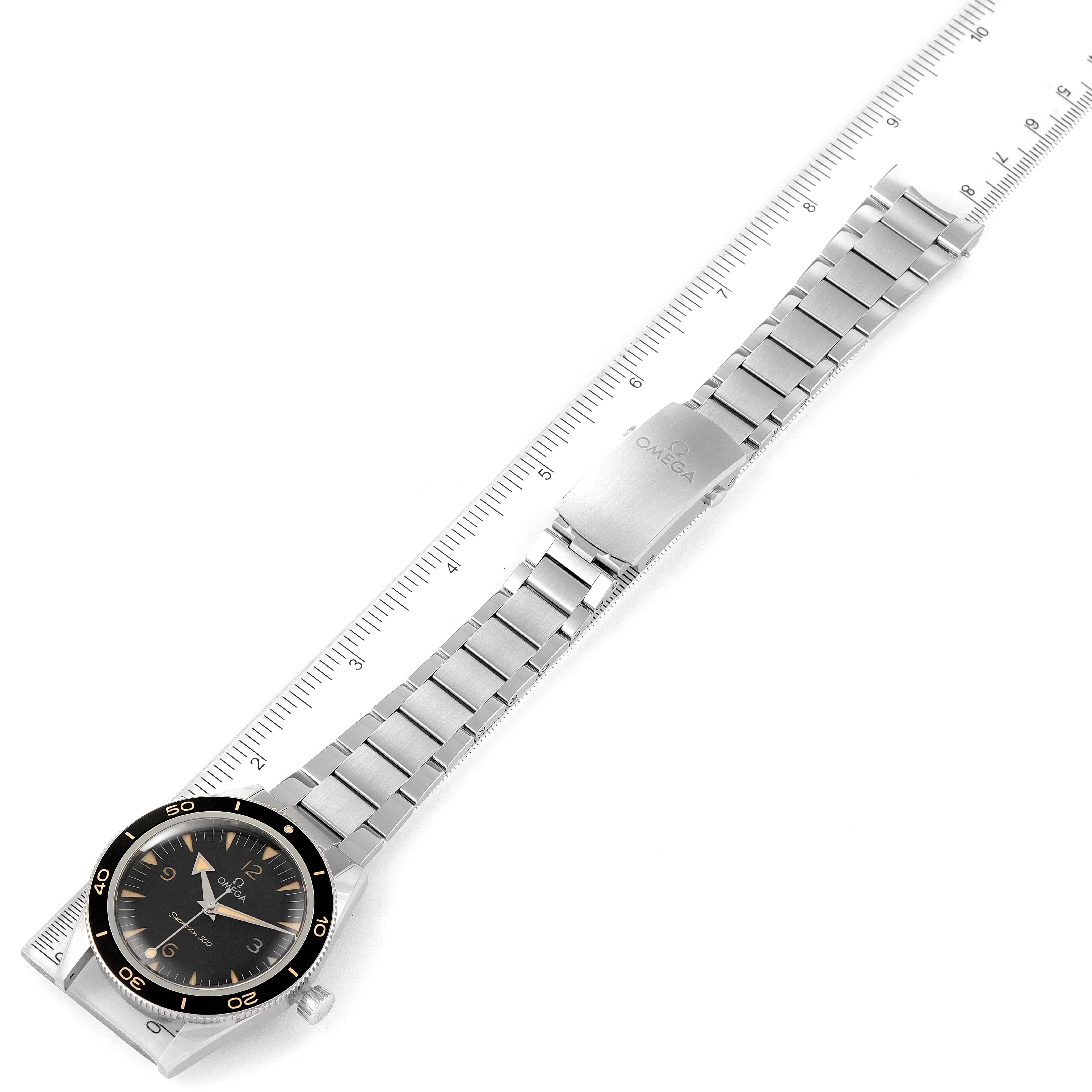 The image shows an Omega Seamaster 234.30.41.21.01.001 Men's Stainless Steel Black Dial 234.30.41.21.01.001 Men's Stainless Steel Black Dial watch from a top-down angle, displaying the watch face, metal bracelet, and clasp alongside a ruler.