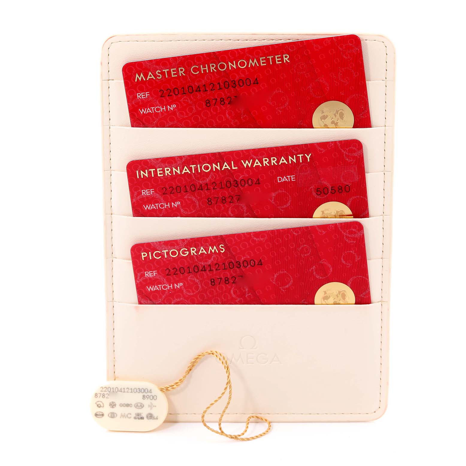 The image shows the warranty cards and identification tag for the Omega Aqua Terra 220.10.41.21.03.004 Men
s Stainless Steel Blue Dial 220.10.41.21.03.004 Men
s Stainless Steel Blue Dial watch model.