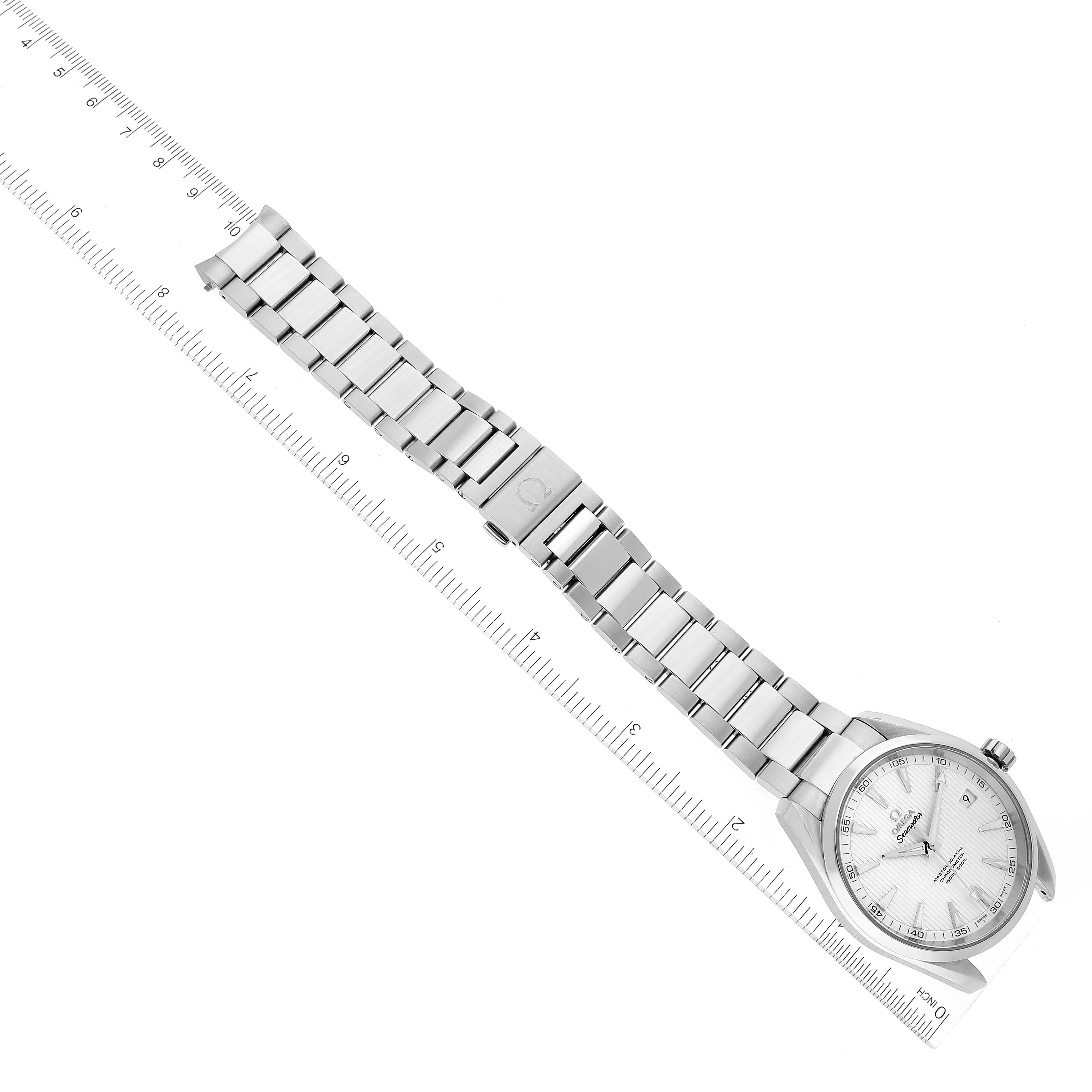 The Omega Aqua Terra 231.10.42.21.02.003 Men's Stainless Steel Silver Dial 231.10.42.21.02.003 Men's Stainless Steel Silver Dial watch is shown at an angle displaying the full length, steel bracelet, clasp, and face next to a ruler.