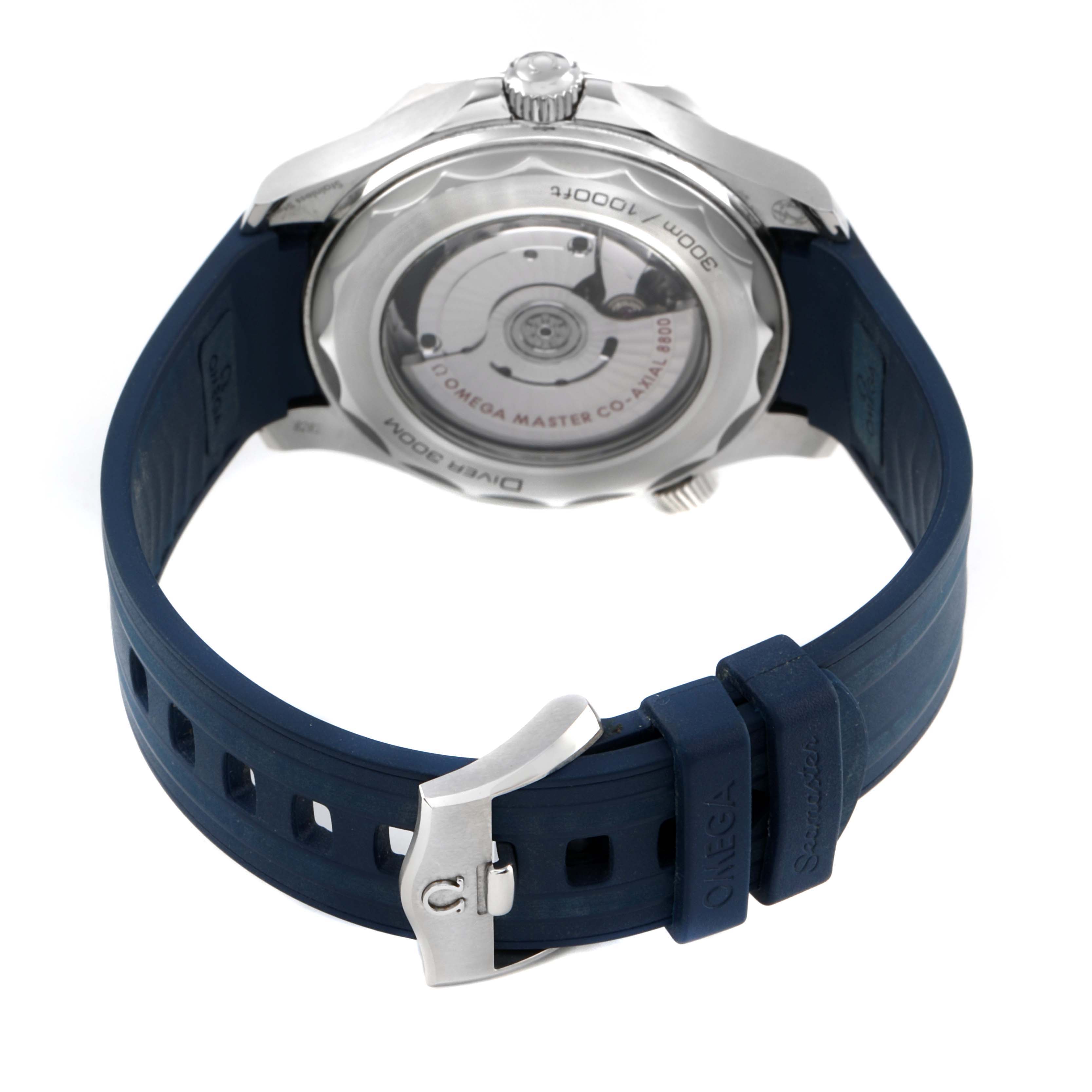 The Omega Seamaster 210.32.42.20.06.001 Men's Stainless Steel Silver Dial watch is shown from the back, highlighting the case back, movement, and blue strap with a clasp.