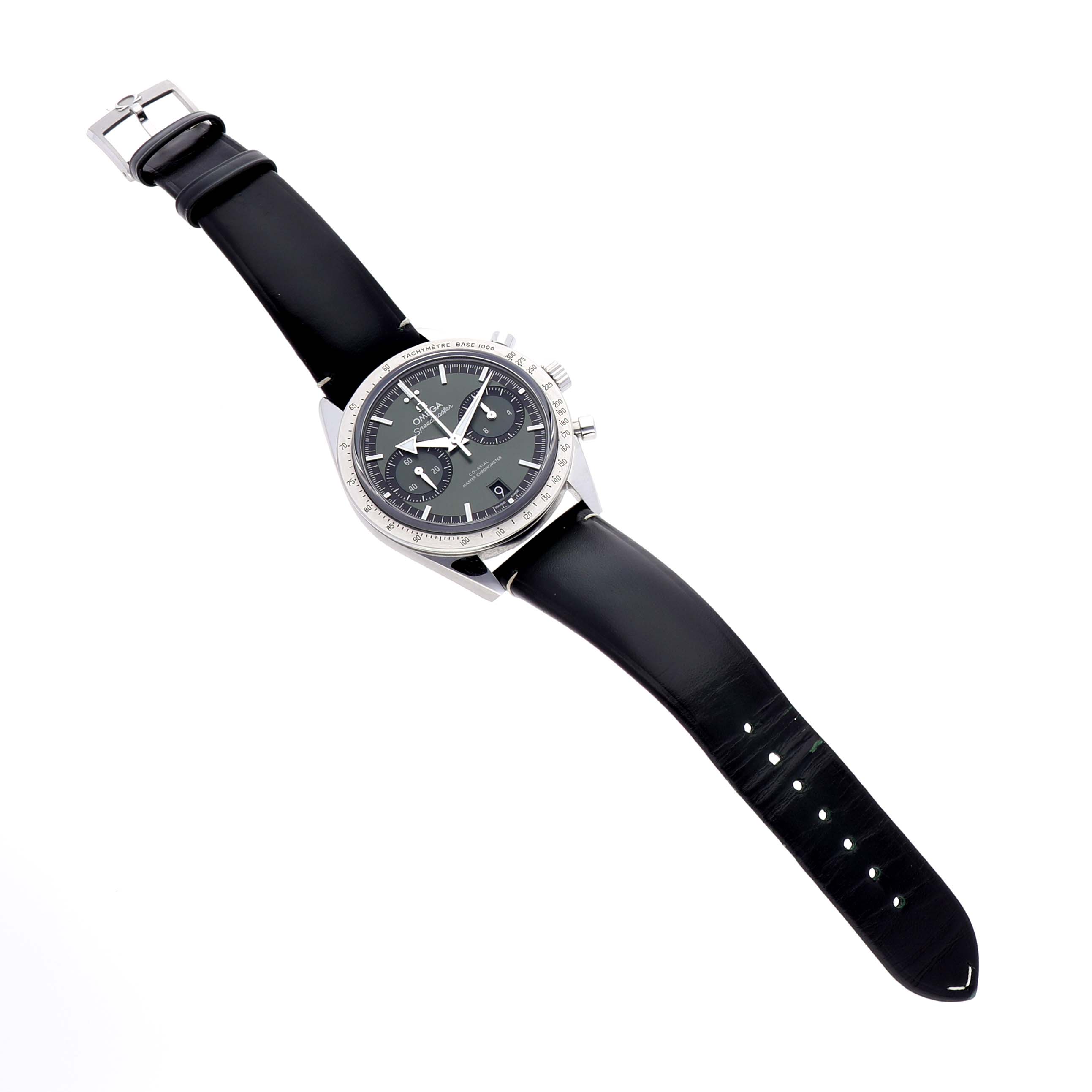 The Omega Speedmaster 332.12.41.51.10.001 Men's Stainless Steel Green Dial watch is shown at an angled view, displaying the face, leather strap, buckle, and side pushers.