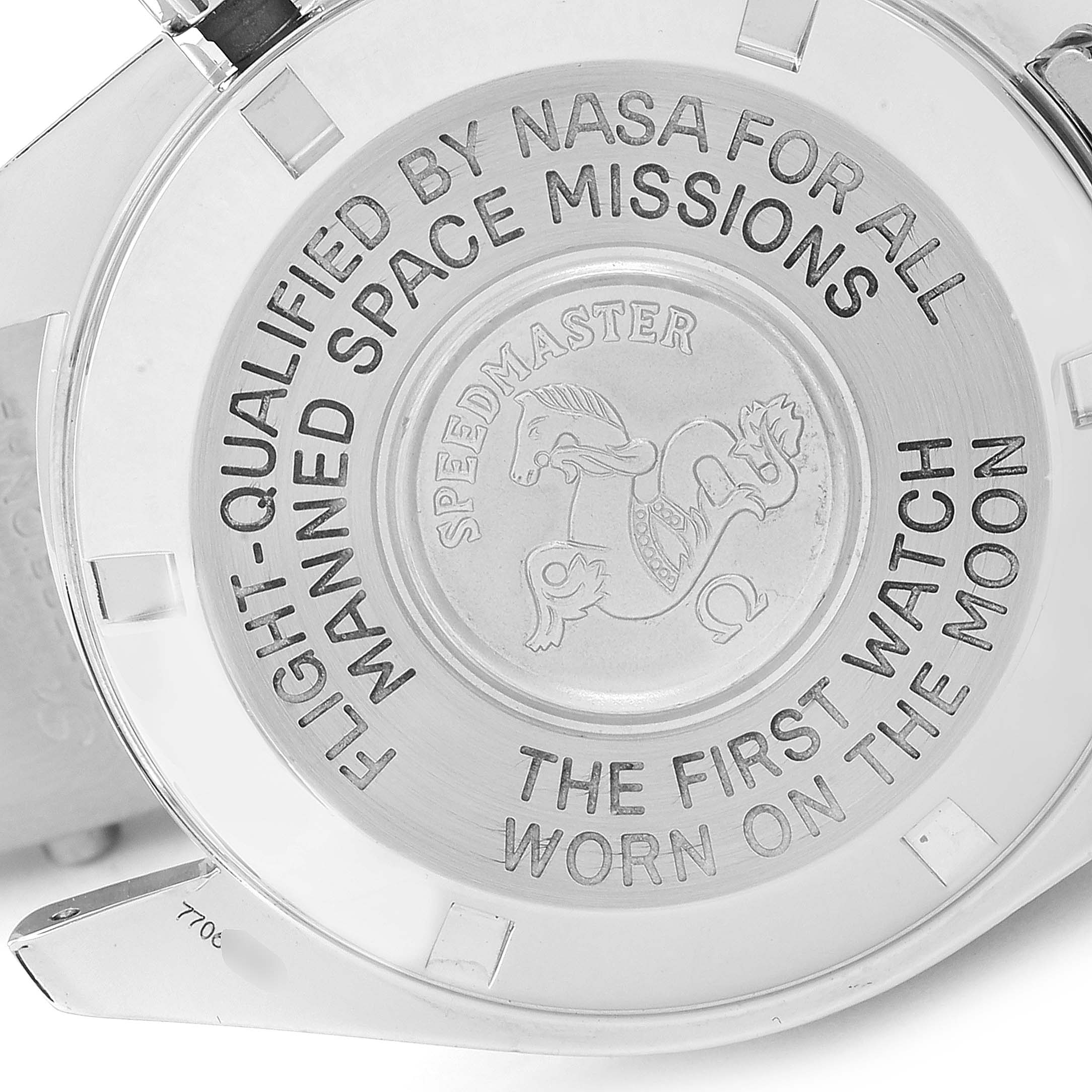 This image shows the engraved case back of an Omega Speedmaster 3570.50.00 Men's Stainless Steel Black Dial 3570.50.00 Men's Stainless Steel Black Dial watch, highlighting its NASA qualification and moon landing history.