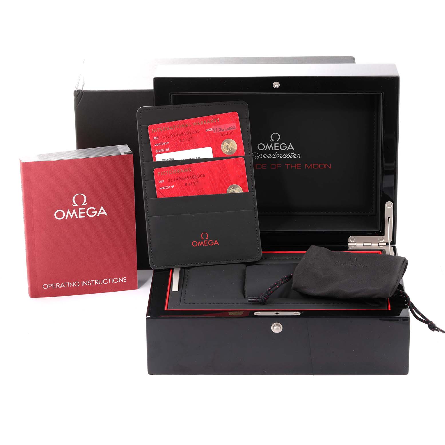 This image shows an Omega Speedmaster 311.92.44.51.01.005 Men's Stainless Steel Black Dial 311.92.44.51.01.005 Men's Stainless Steel Black Dial watch box with warranty cards, an operating instructions booklet, and a watch pouch.