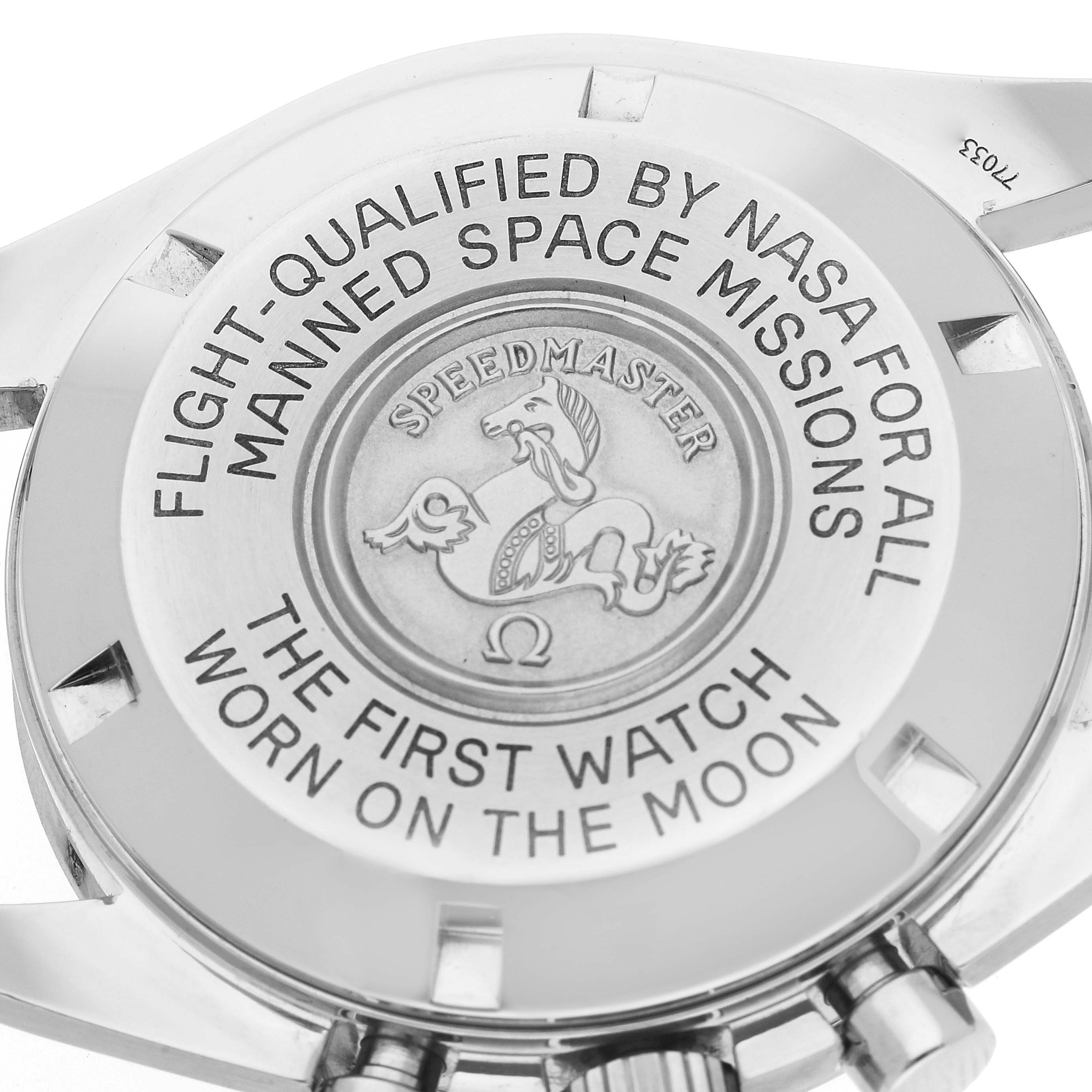 The image displays the case back and chronograph pushers of an Omega Speedmaster 3570.50.00 Men's Stainless Steel Black Dial 3570.50.00 Men's Stainless Steel Black Dial watch, highlighting its NASA qualification and Moon landing inscription.