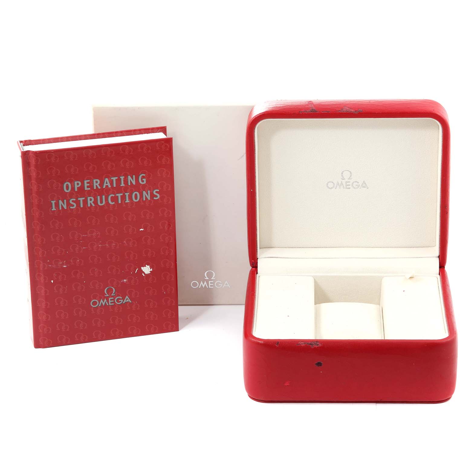 The image shows an Omega Speedmaster 3570.50.00 Men's Stainless Steel Black Dial 3570.50.00 Men's Stainless Steel Black Dial watch box, outer box, and operating instructions manual from a front angle.