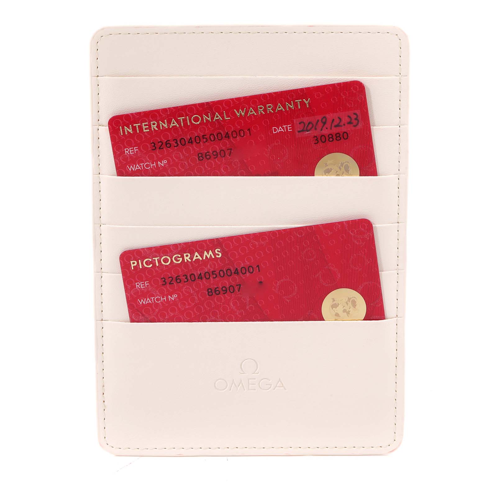 The image shows an Omega Speedmaster 326.30.40.50.04.001 Men's Stainless Steel White Dial 326.30.40.50.04.001 Men's Stainless Steel White Dial watch's white cardholder containing two red warranty and pictogram cards.