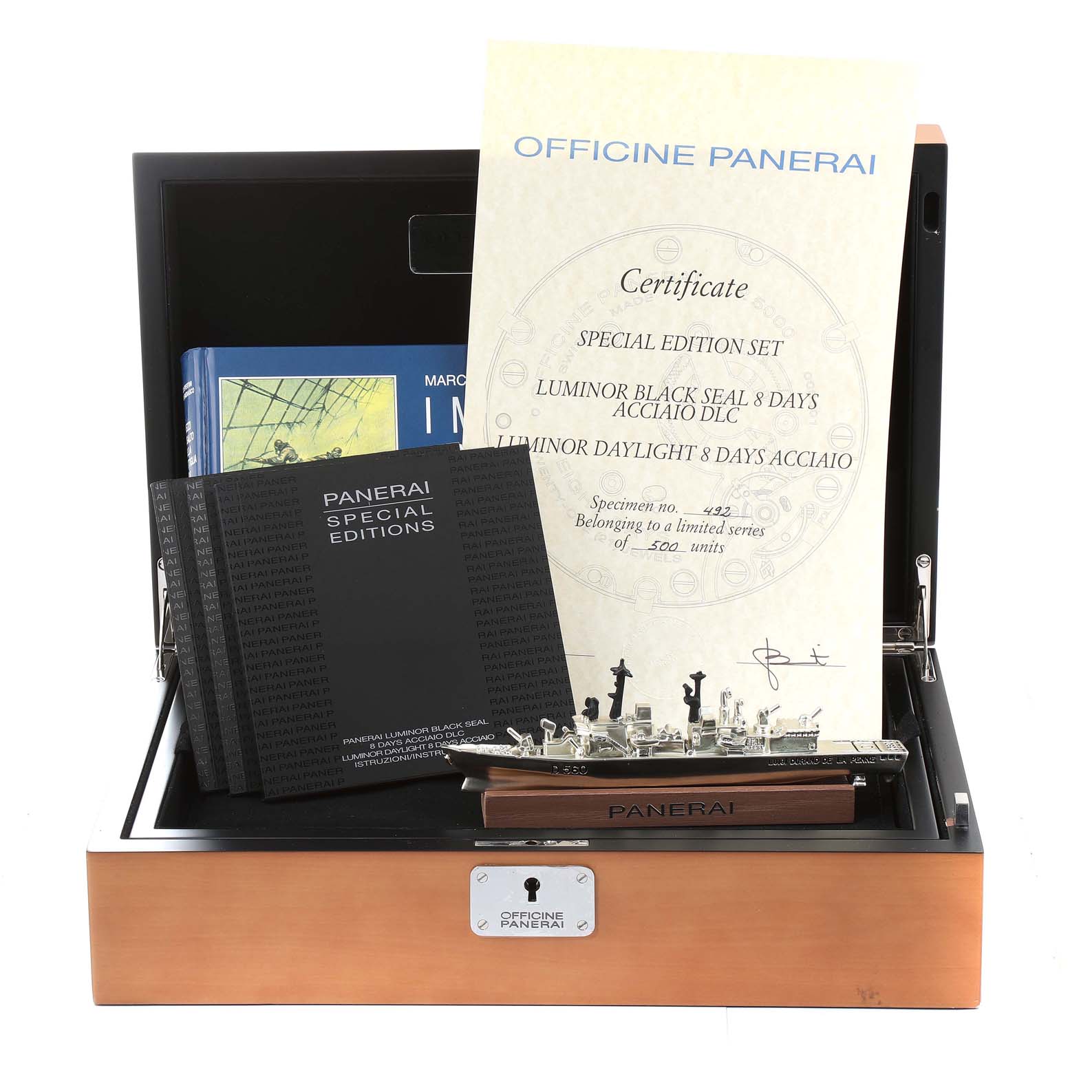 The image shows a Panerai Luminor PAM00785 Men's Stainless Steel Black Dial PAM00785 Men's Stainless Steel Black Dial watch special edition set with a certificate, manuals, and a model ship in an open box.