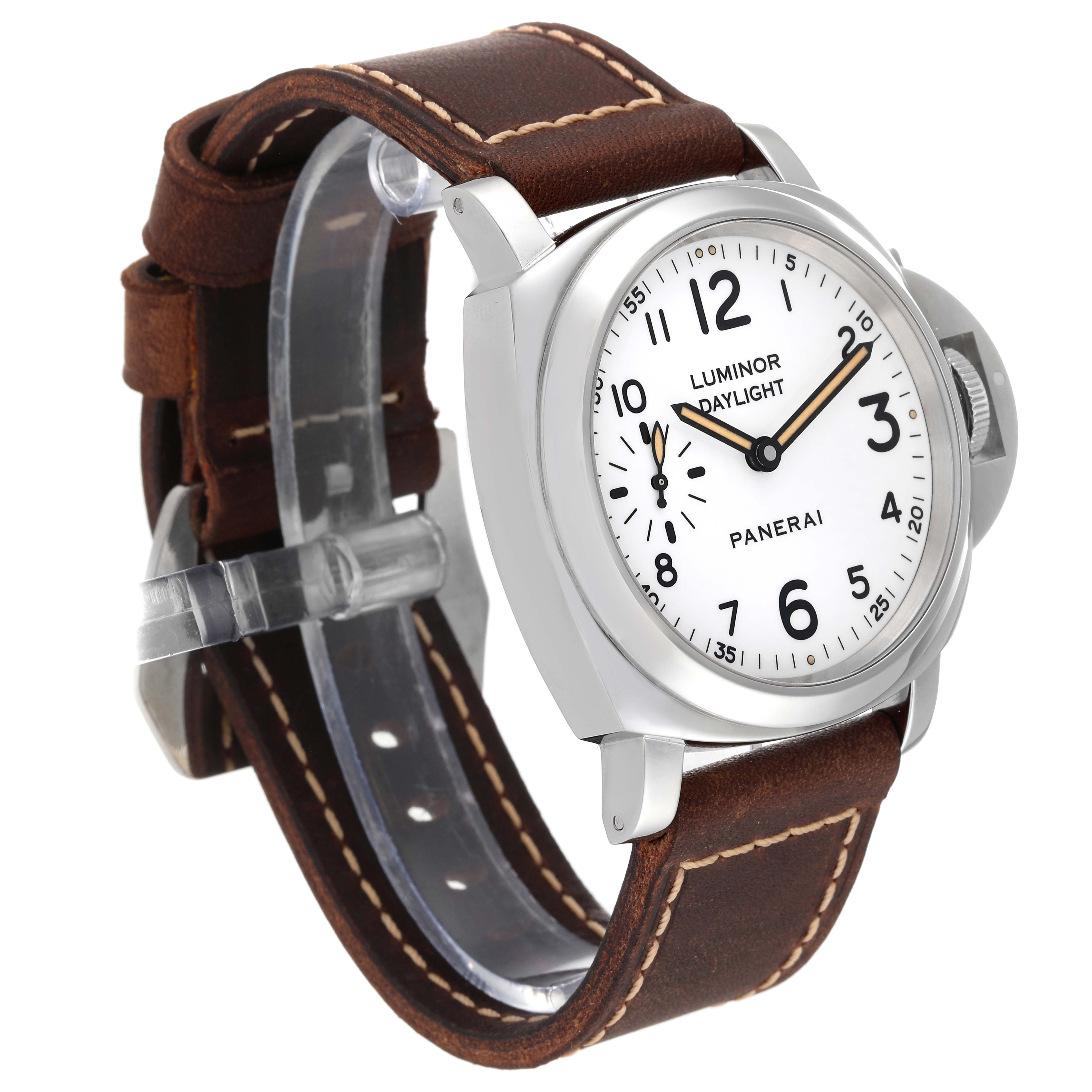 The Panerai Luminor PAM00785 Men's Stainless Steel Black Dial PAM00785 Men's Stainless Steel Black Dial model watch is shown at a three-quarter angle, highlighting its white dial, case, crown guard, and brown leather strap.