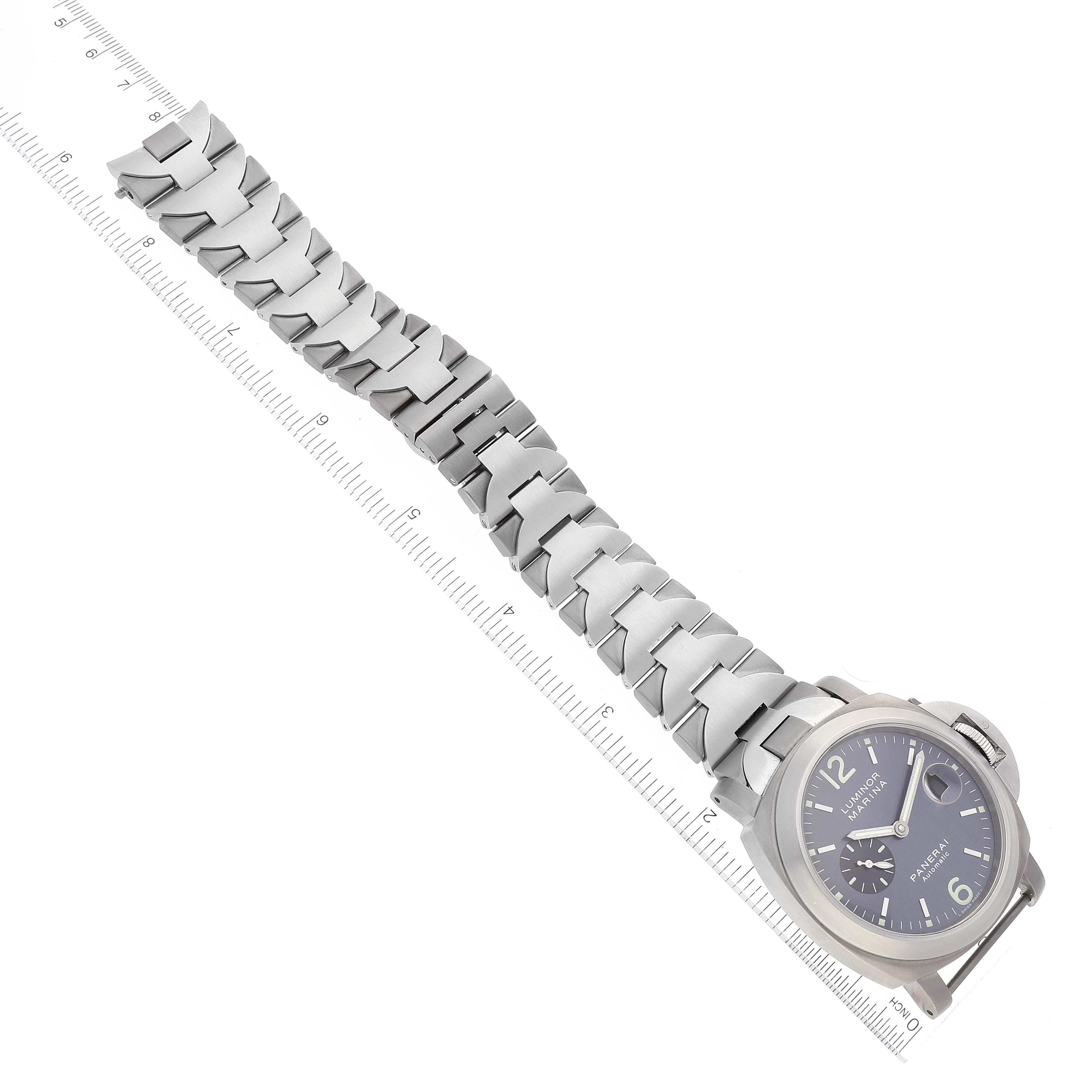 The image shows a Panerai Luminor PAM00091 Men's Titanium Grey Dial PAM00091 Men's Titanium Grey Dial watch from a top-down angle, featuring the watch face and entire metal bracelet.