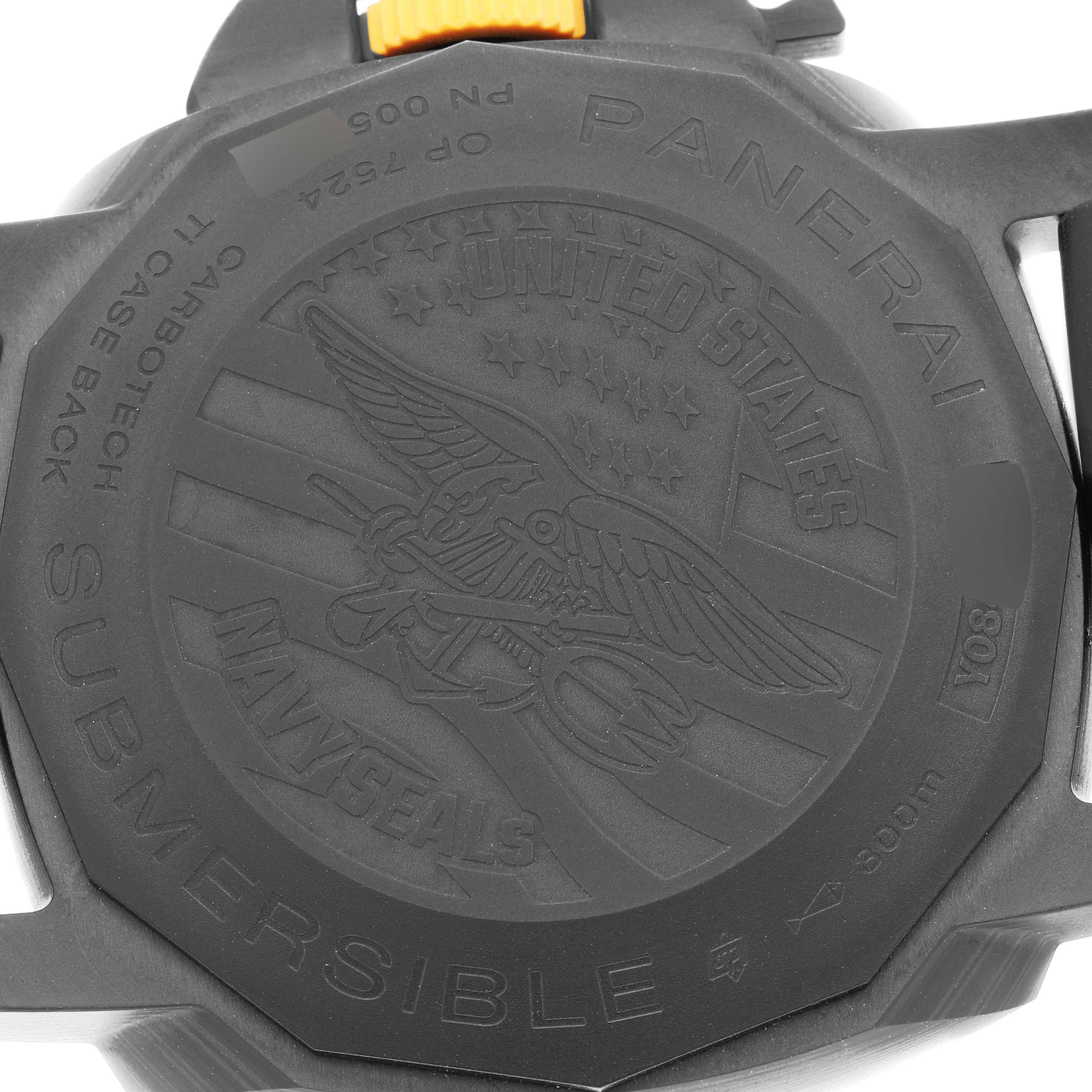 This image shows the back case of a Panerai Submersible PAM01324 Men's Ceramic Grey Dial PAM01324 Men's Ceramic Grey Dial watch, featuring an engraved design related to the U.S. Navy SEALs.