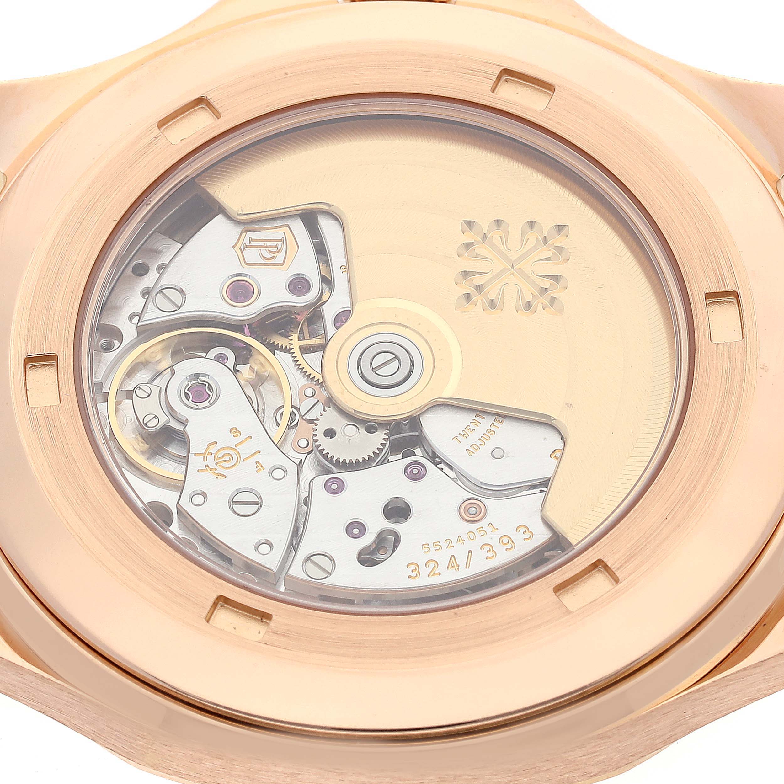 This image shows the back view of a Patek Philippe Aquanaut 5167R-001 Men's Rose Gold Brown Dial 5167R-001 Men's Rose Gold Brown Dial watch, focusing on the internal mechanical movement and rotor.