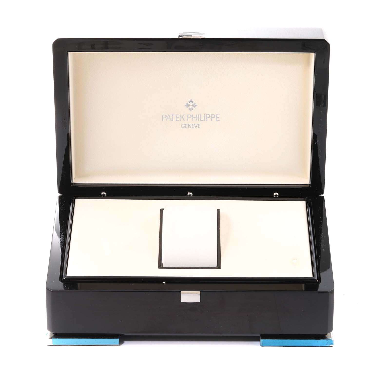 The image shows an open Patek Philippe Aquanaut 5167R-001 Men's Rose Gold Brown Dial 5167R-001 Men's Rose Gold Brown Dial watch box, displaying its interior with the brand's logo.