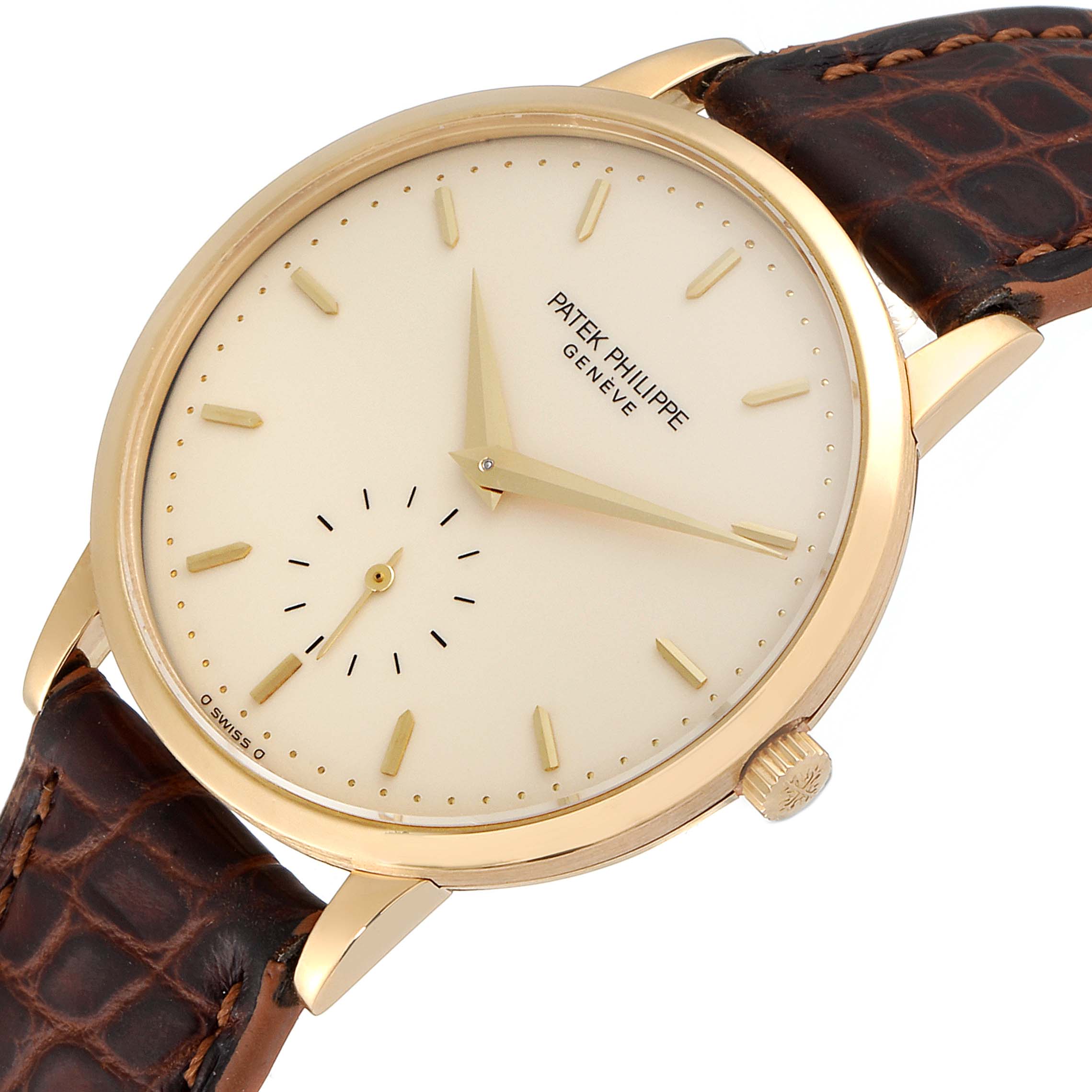 This image shows a close-up angle of a Patek Philippe Calatrava 3893J Men's Yellow Gold Beige Dial 3893J Men's Yellow Gold Beige Dial watch, illustrating its dial, hands, case, and leather strap.