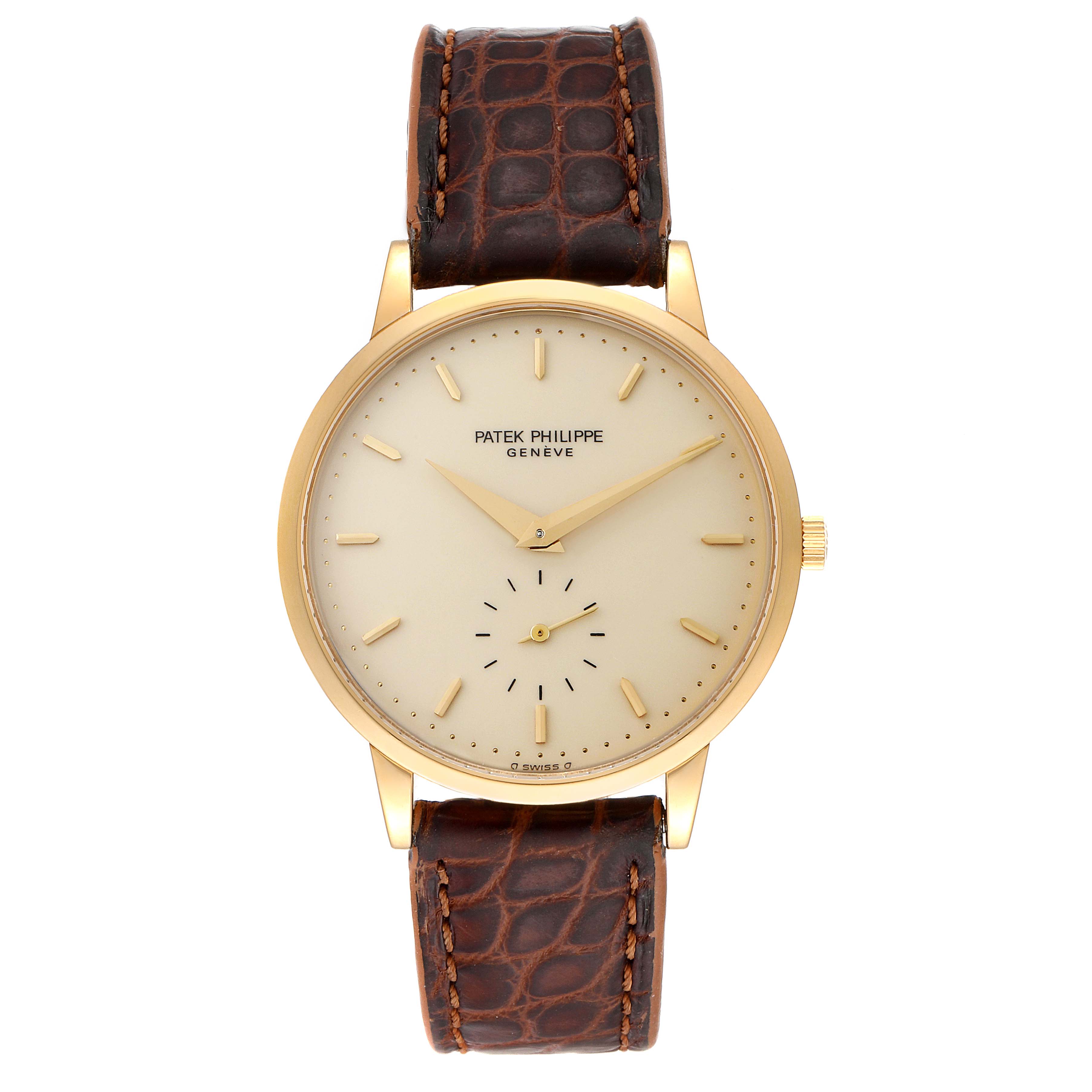 The image shows a front view of the Patek Philippe Calatrava 3893J Men's Yellow Gold Beige Dial 3893J Men's Yellow Gold Beige Dial watch, highlighting its dial, hands, case, and leather strap.