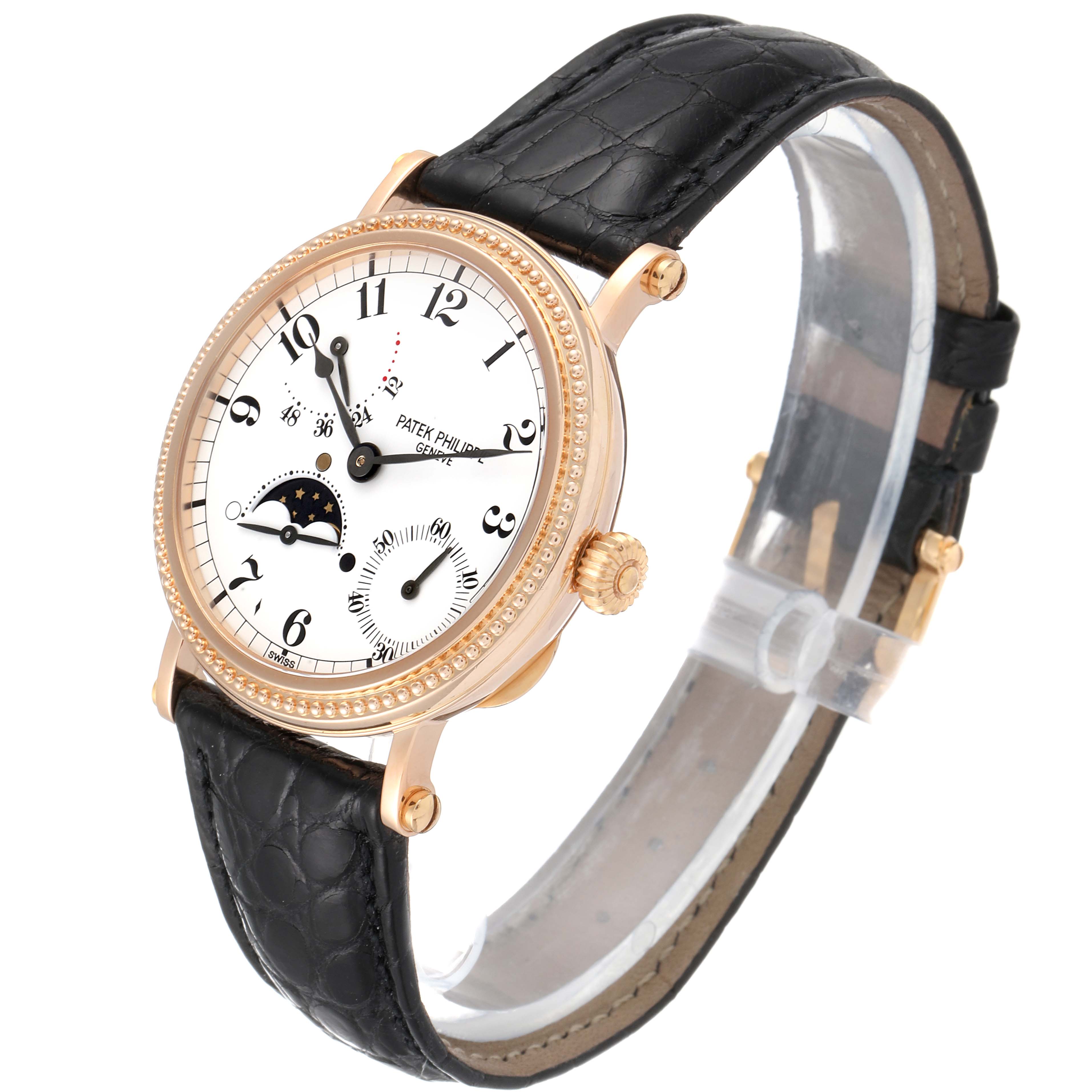 The Patek Philippe Calatrava 5015 Men's Rose Gold White Dial 5015 Men's Rose Gold White Dial watch is shown at a three-quarter angle, displaying the face, hands, crown, and leather strap.