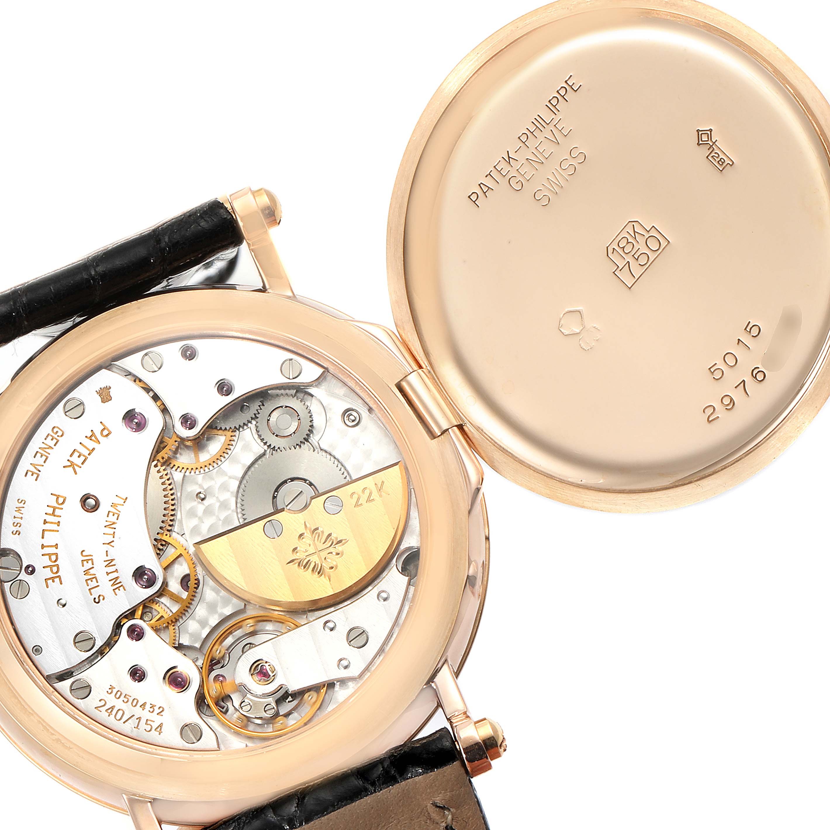 The image shows the open case back of the Patek Philippe Calatrava 5015 Men's Rose Gold White Dial 5015 Men's Rose Gold White Dial watch, revealing the inner mechanical movement.