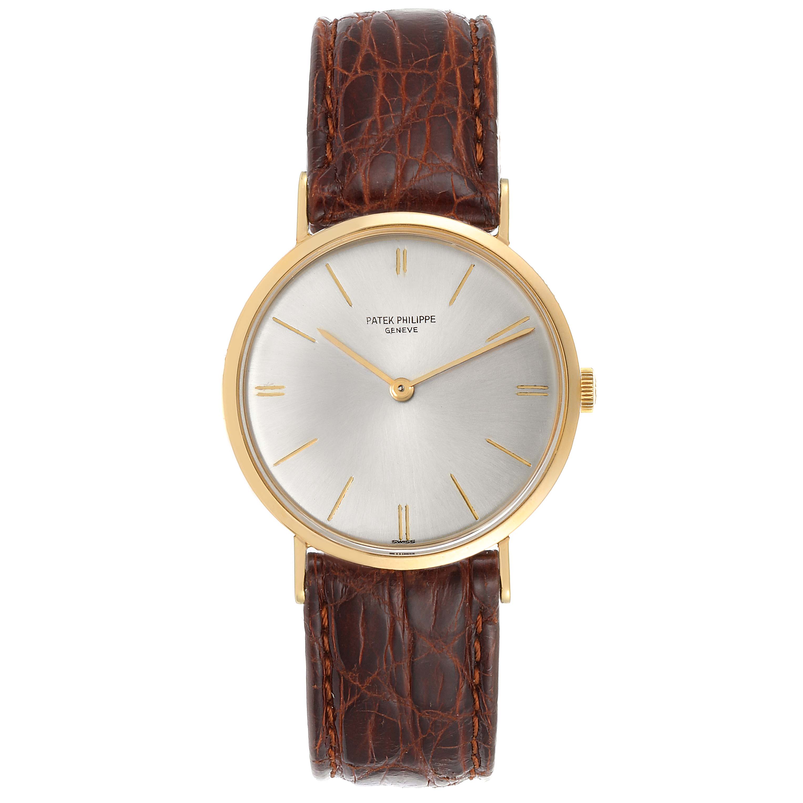 The image shows a front view of the Vintage Patek Philippe watch with a gold case and brown leather strap.
