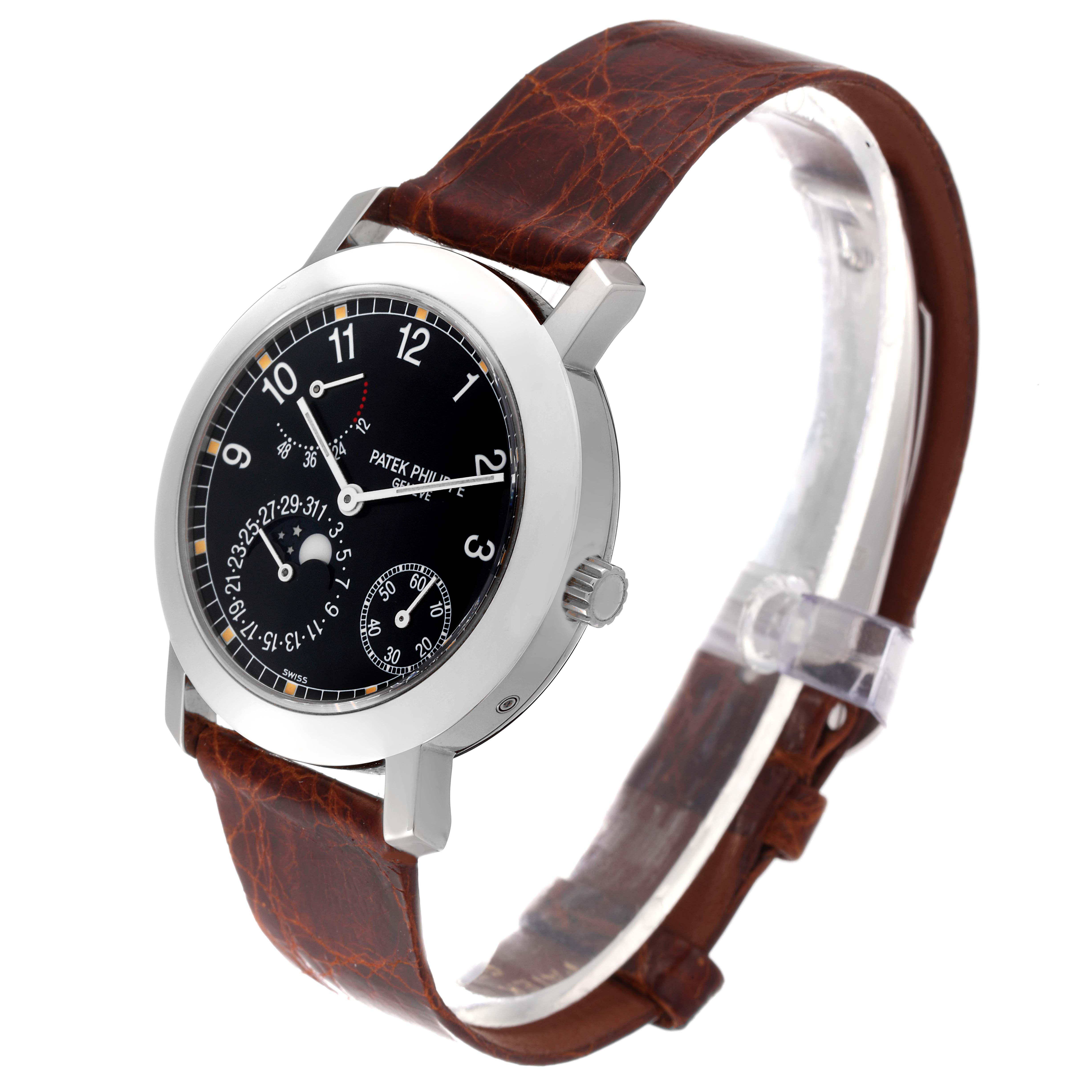 The Patek Philippe Complications 5055G-001 Men's White Gold Black Dial watch is shown at a three-quarter angle, featuring the face, bezel, crown, and brown leather strap.