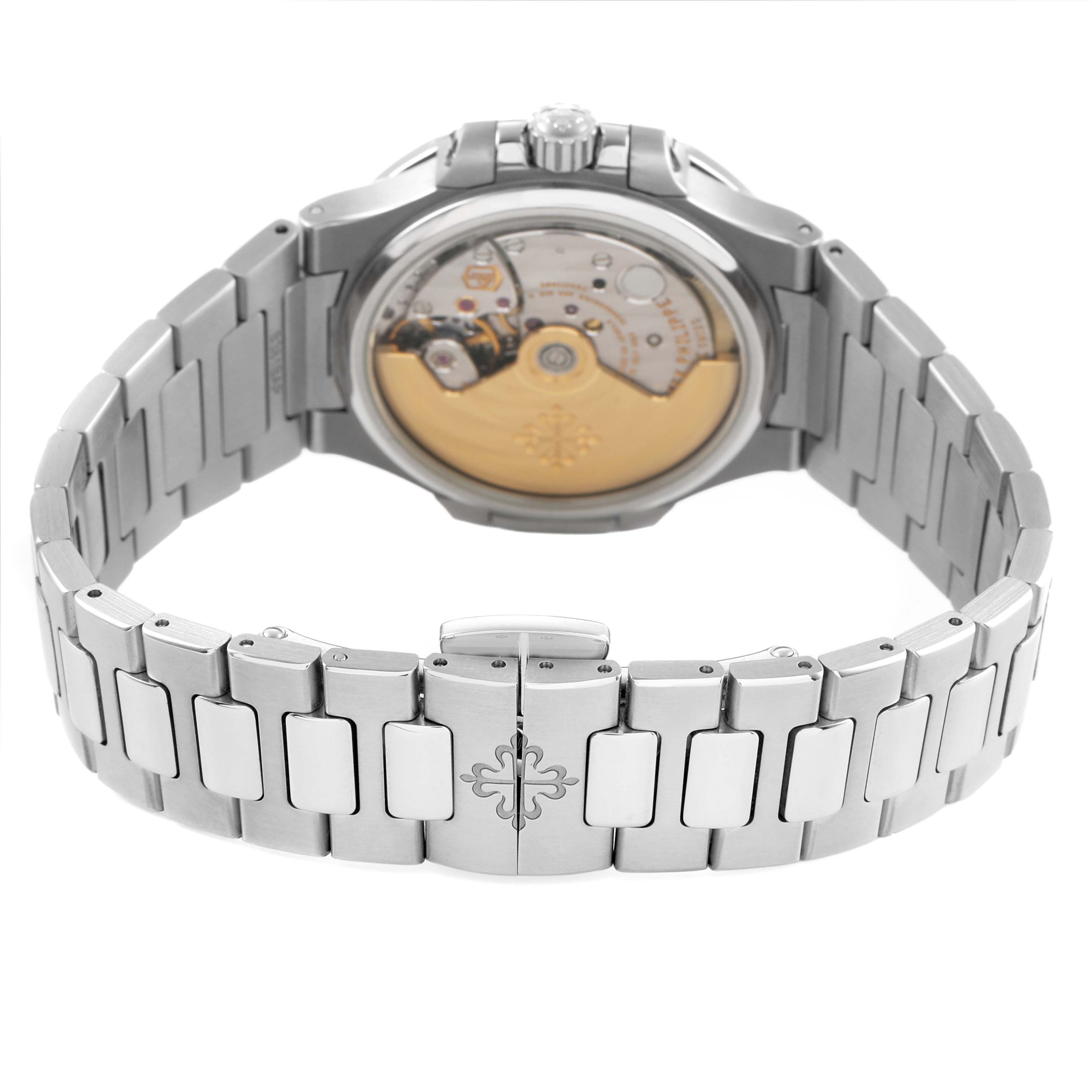 The image shows the back view of a Patek Philippe Nautilus 7008/1A-011 Women's Stainless Steel Silver Dial watch, highlighting the movement and bracelet clasp.