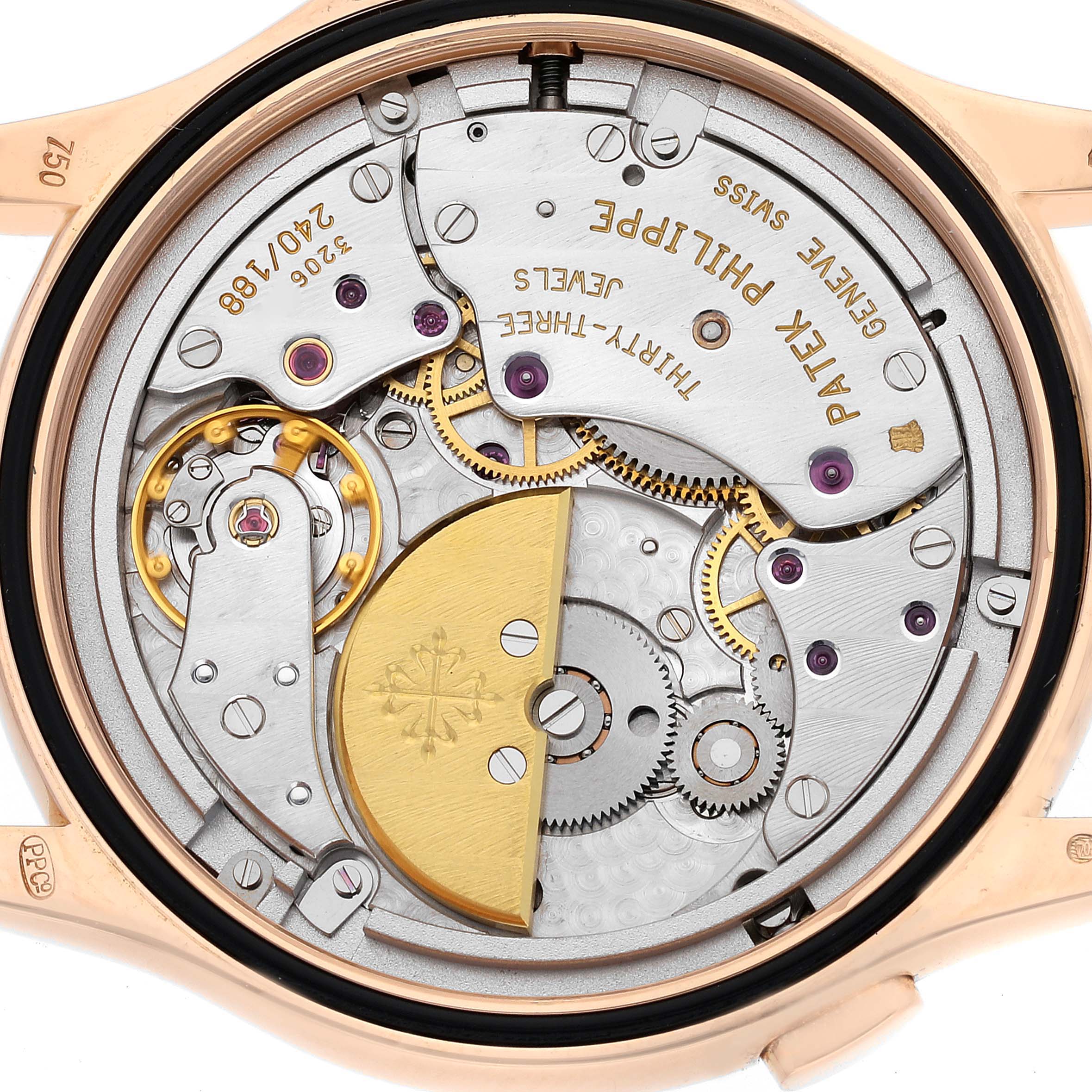 This image shows the intricate movement and inner workings of the Patek Philippe Complications 5110R-001 Men's Rose Gold Silver Dial 5110R-001 Men's Rose Gold Silver Dial watch from a rear angle.