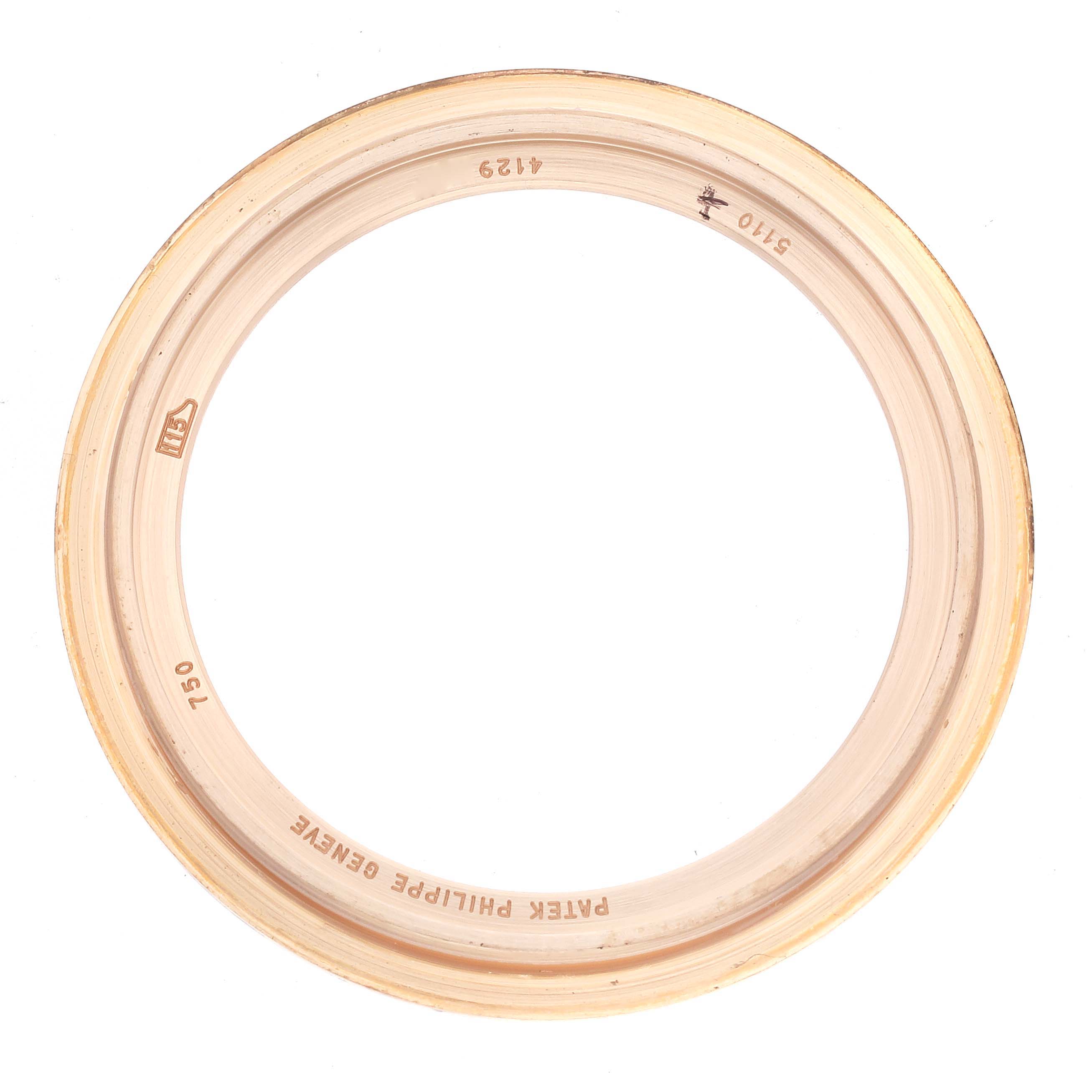 The image shows the bezel for a Patek Philippe Complications 5110R-001 Men's Rose Gold Silver Dial 5110R-001 Men's Rose Gold Silver Dial watch, viewed from above.