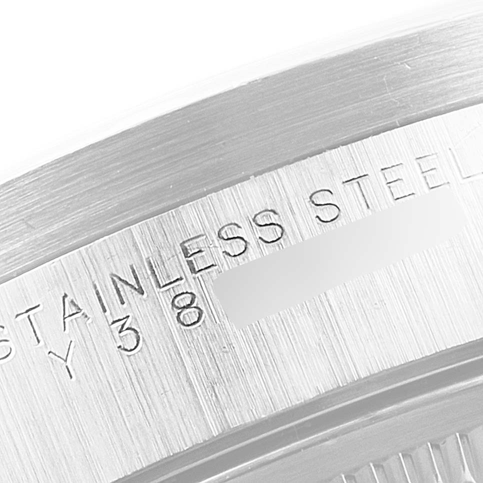 Close-up image of the stainless steel case back of a Rolex Air-King 14010 Men's Stainless Steel Black Dial 14010 Men's Stainless Steel Black Dial watch, highlighting the engraved text.