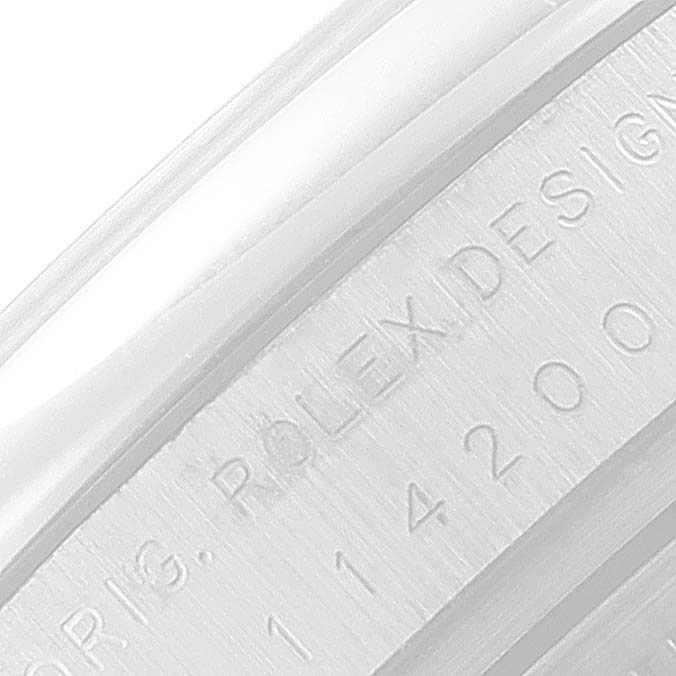 This close-up image shows the engraved bezel edge of a Rolex Air-King 114200 Men's Stainless Steel Silver Dial 114200 Men's Stainless Steel Silver Dial watch, featuring the model number.