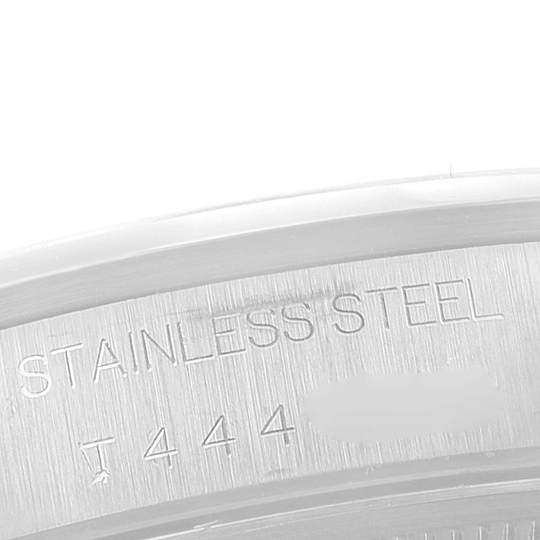 The image shows a close-up of the stainless steel inscription on the case back of a Rolex Air-King 14000 Men's Stainless Steel White Dial 14000 Men's Stainless Steel White Dial watch.