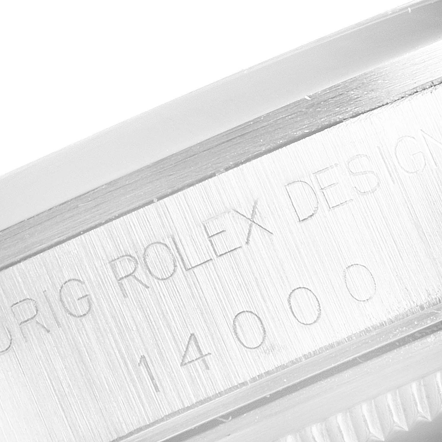 This image shows a close-up of the side of the case, showcasing the serial and model number engravings of the Rolex Air-King 14000 Men's Stainless Steel White Dial 14000 Men's Stainless Steel White Dial watch.