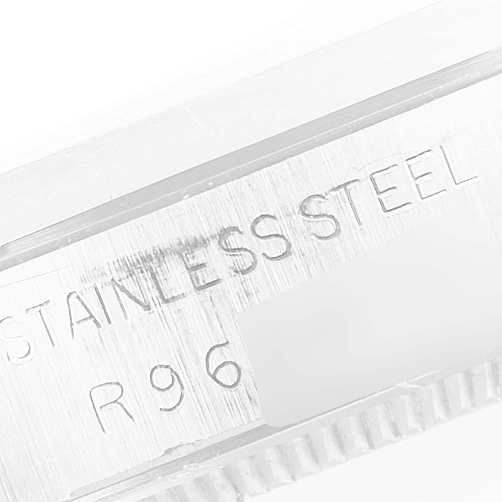 This close-up image shows the side engraving of a stainless steel Vintage Collection model by Rolex.