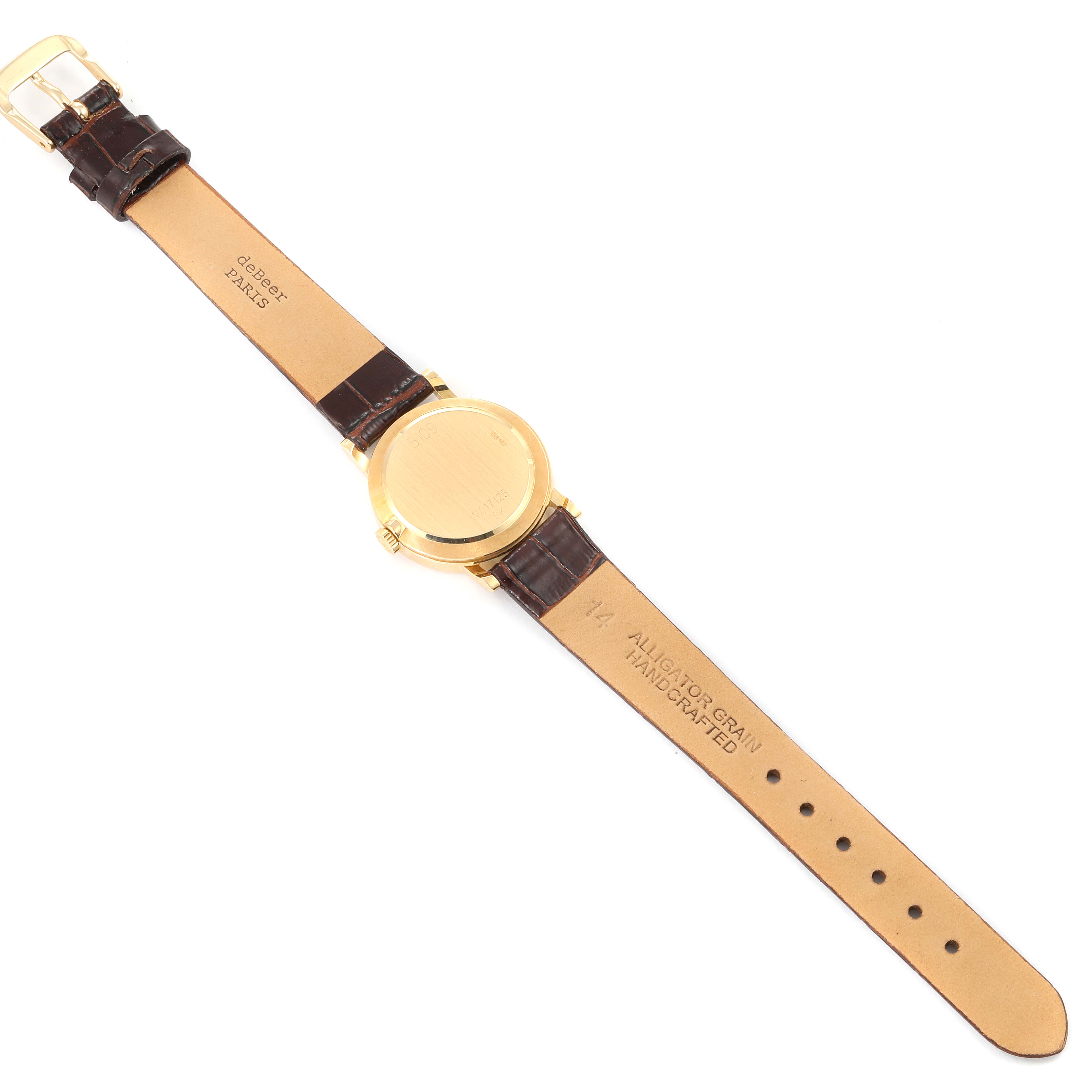 This image shows the back case and entire strap of a Rolex Cellini 5109 Women's Yellow Gold White Dial 5109 Women's Yellow Gold White Dial watch laid flat.
