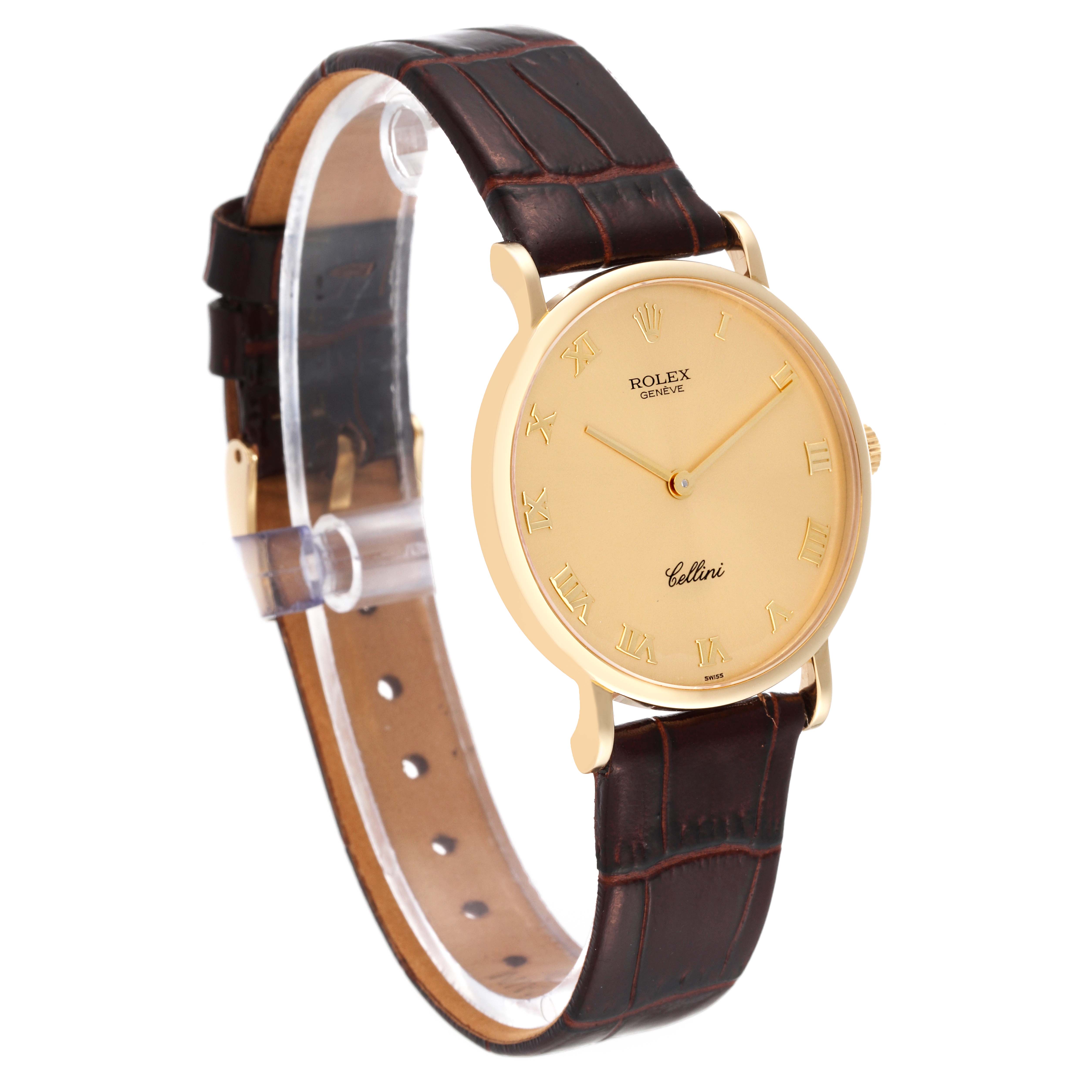 The image shows a Rolex Cellini 5112 Men
s Yellow Gold Champagne Dial 5112 Men
s Yellow Gold Champagne Dial watch at a three-quarter angle, highlighting its gold case, brown leather strap, and Roman numeral dial.