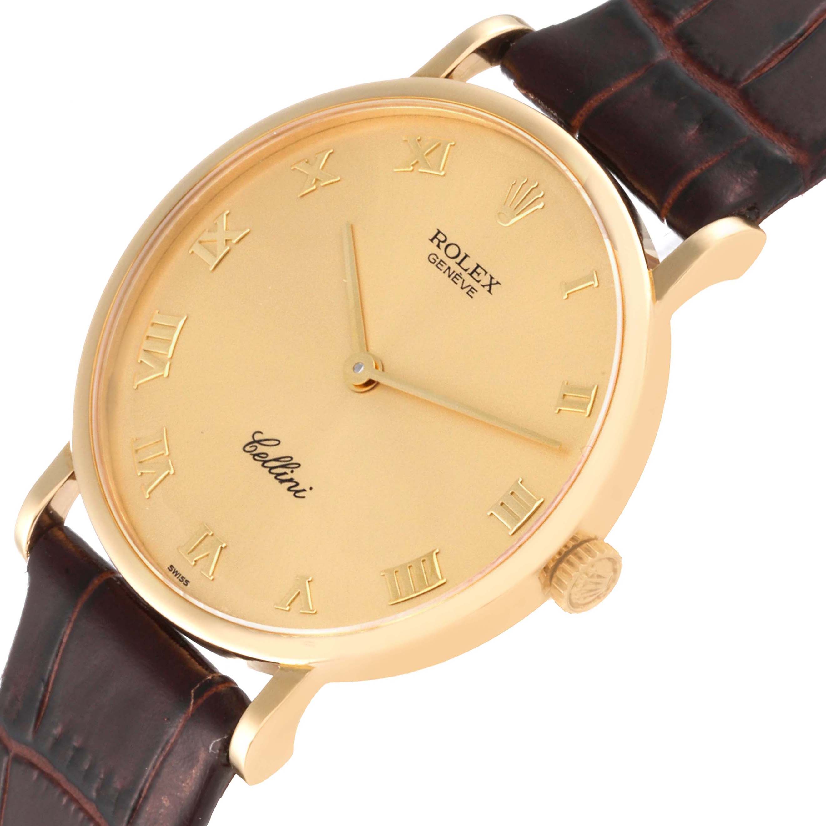 This image shows a close-up of a Rolex Cellini 5112 Men
s Yellow Gold Champagne Dial 5112 Men
s Yellow Gold Champagne Dial watch angled to display the dial, crown, leather strap, and part of the case.