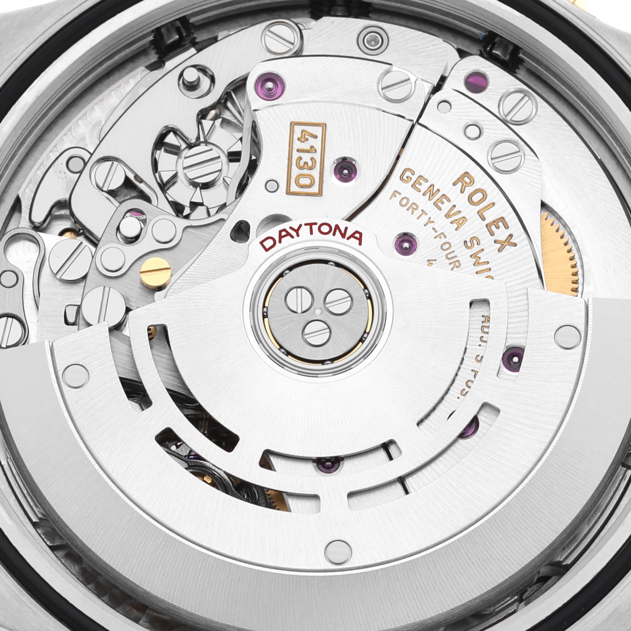 The image shows the intricate inner mechanism of a Rolex Daytona 116503 Men
s Steel and Gold (two tone) Black Dial 116503 Men
s Steel and Gold (two tone) Black Dial watch, viewed from the back.