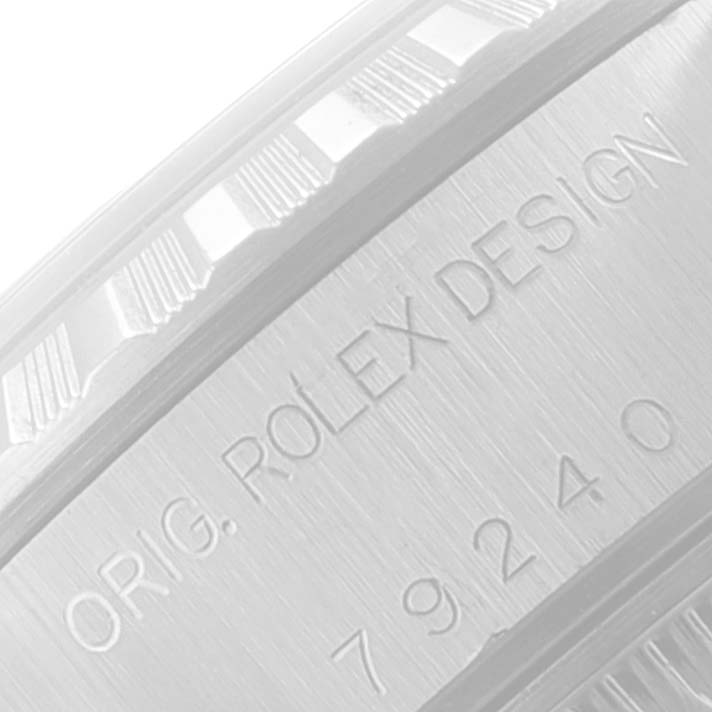 The image shows a close-up of the case side of a Rolex Date 79240 Women's Stainless Steel Black Dial 79240 Women's Stainless Steel Black Dial model, displaying the "ORIG. ROLEX DESIGN" engraving.