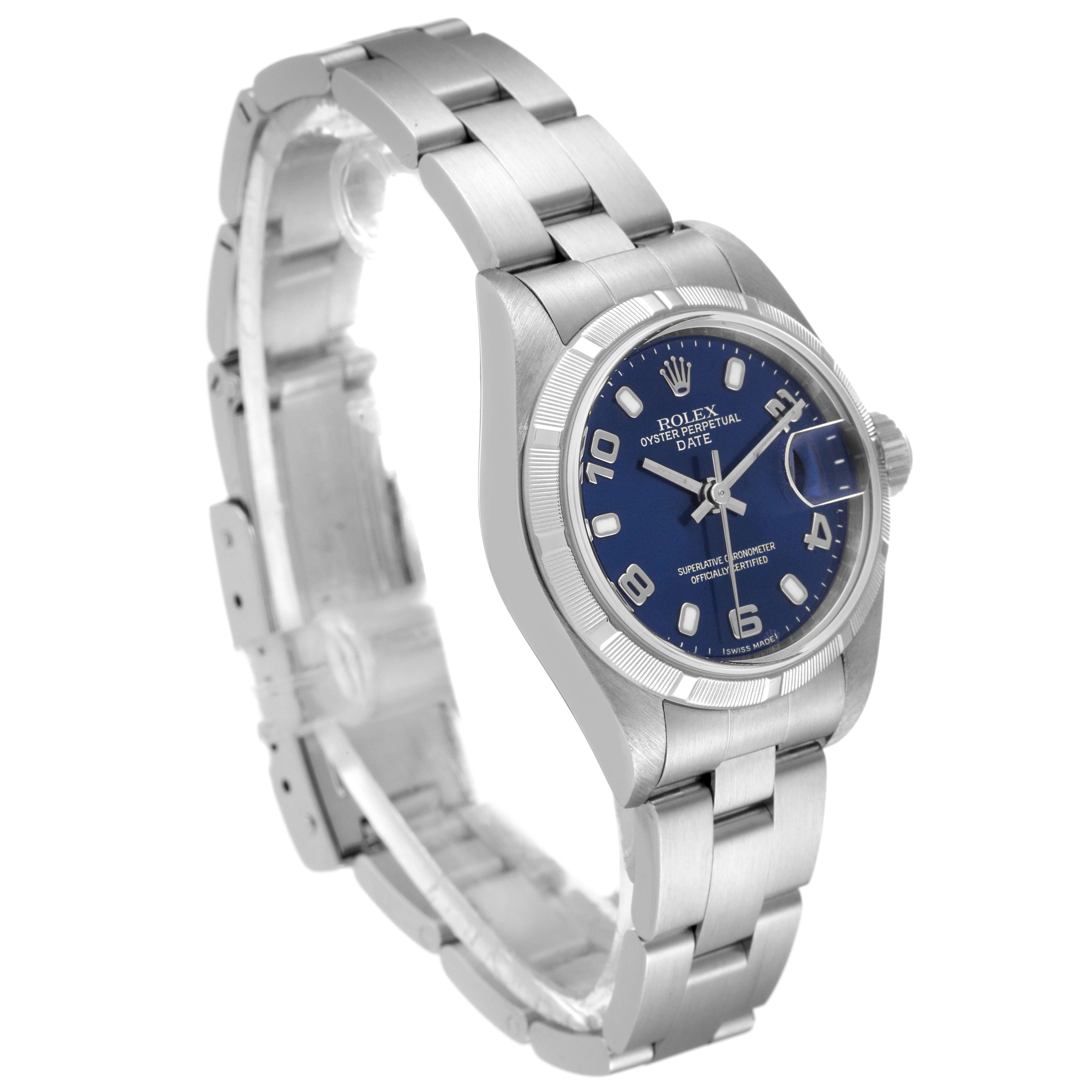 The image shows a Rolex Date 79190 Women's Stainless Steel Blue Dial 79190 Women's Stainless Steel Blue Dial model watch from an angled perspective, highlighting its blue dial, metal bracelet, and date window.