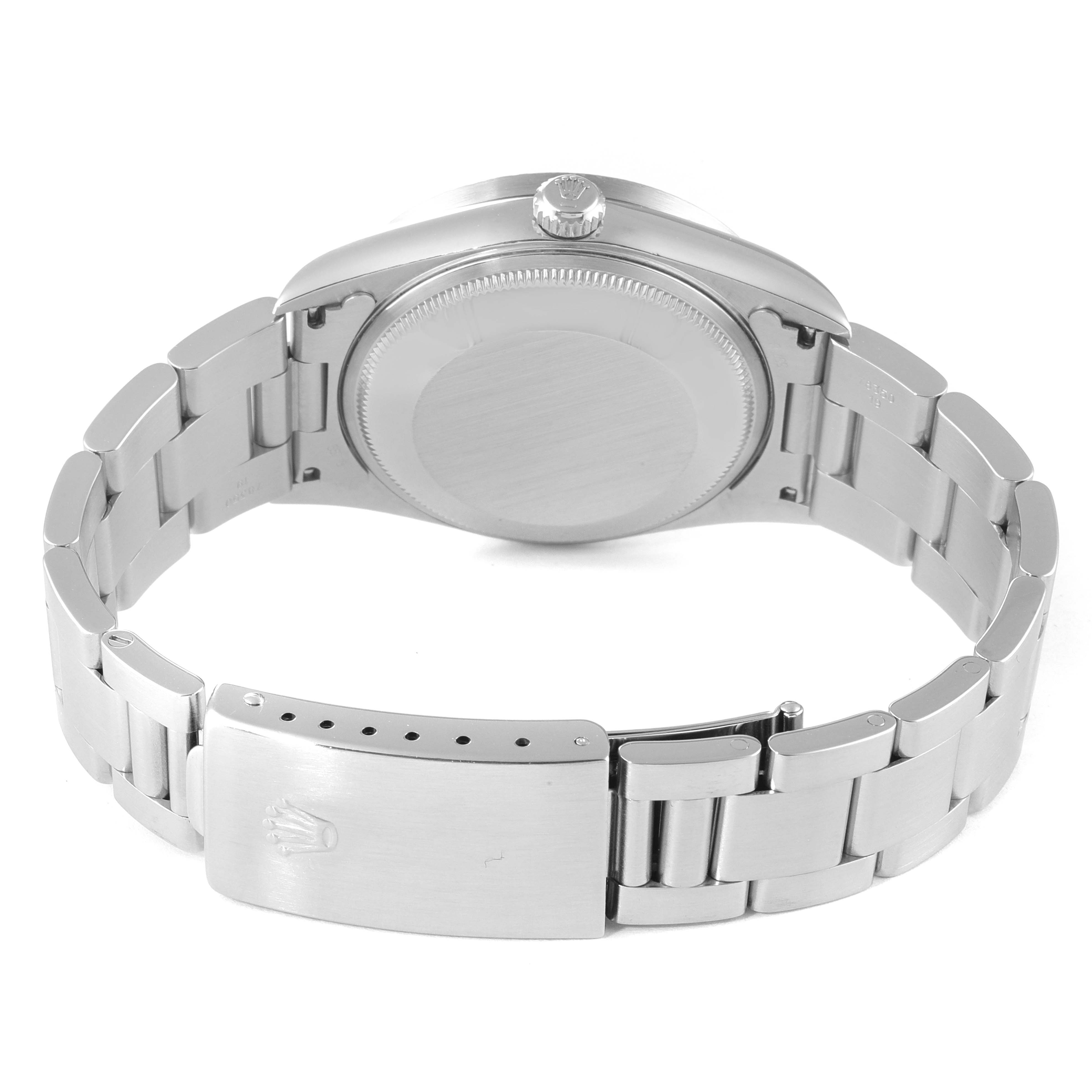 The image shows the back case, crown, and clasp of a Rolex Air-King 15210 Men's Stainless Steel Blue Dial 15210 Men's Stainless Steel Blue Dial watch, photographed from the rear.