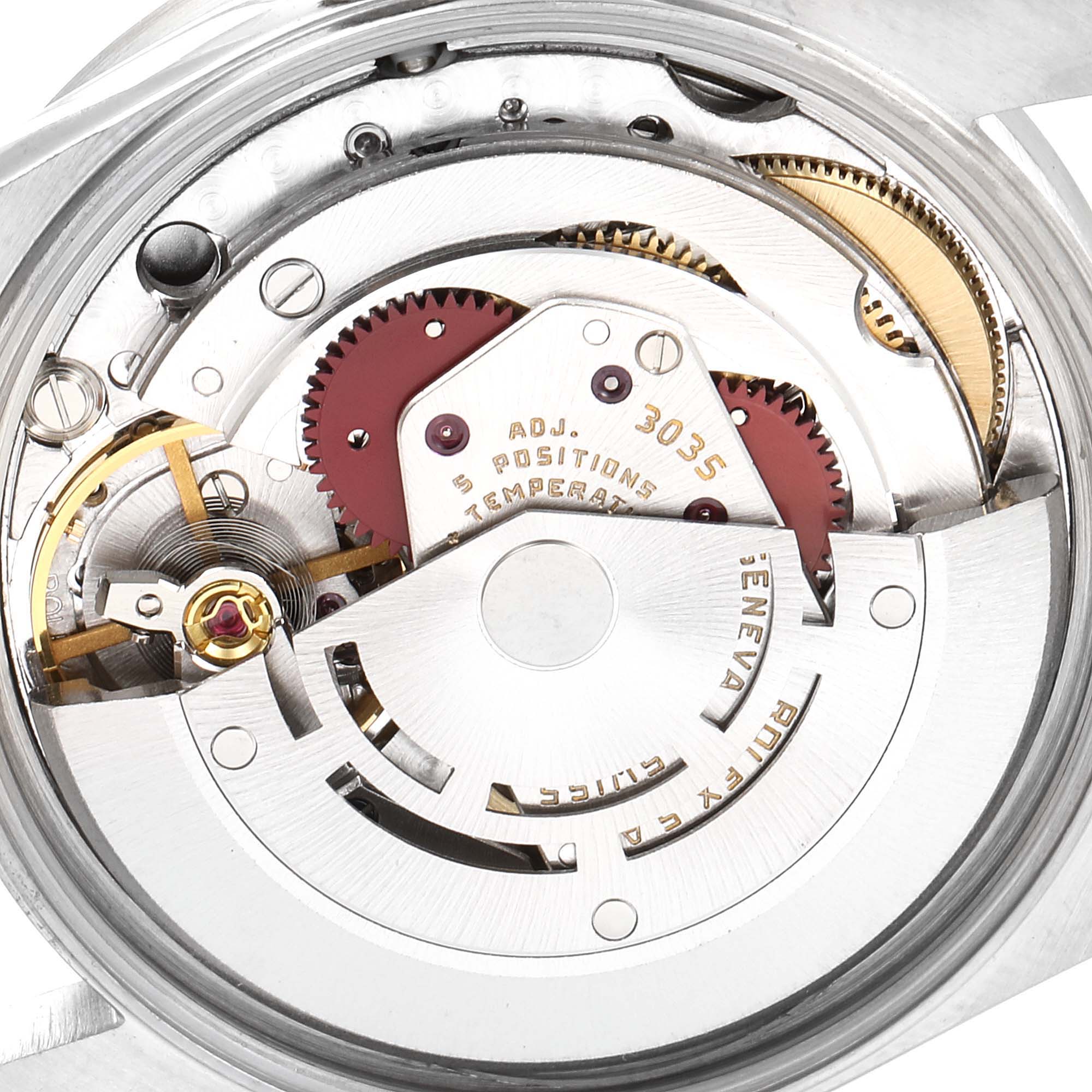 The image shows the intricate inner mechanical movement of a Vintage Collection model by Rolex from a back angle.