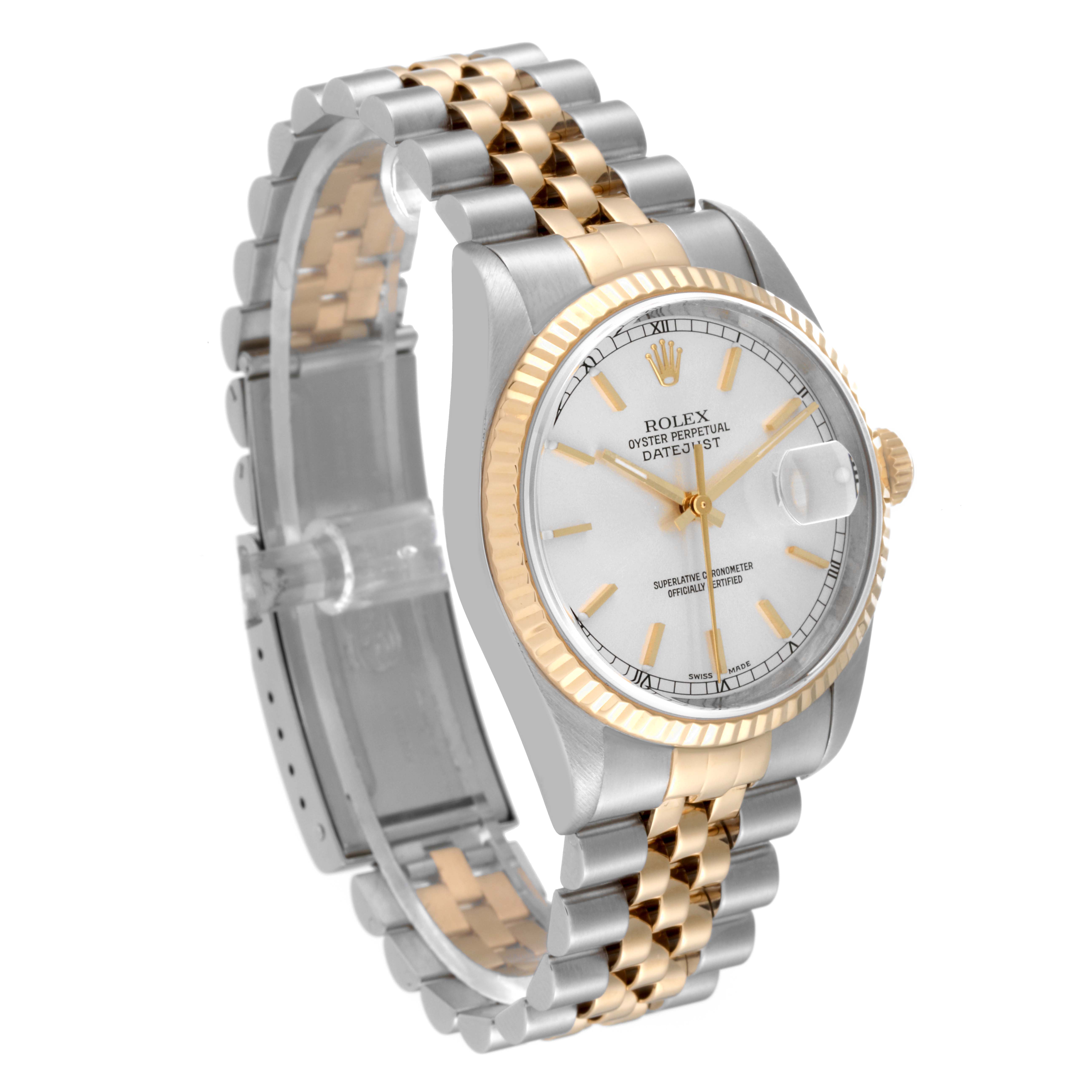 The Rolex Datejust 16233 Men's Steel and Gold (two tone) Silver Dial 16233 Men's Steel and Gold (two tone) Silver Dial watch is shown at an angle highlighting its face, bezel, crown, and two-tone bracelet.